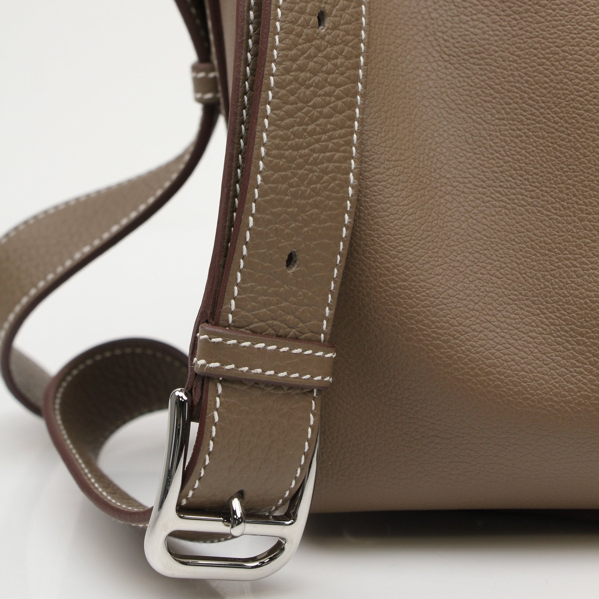 Hermès Petite Courrier handbag by Gold & Beyond, showcasing a stylish leather crossbody bag with gold hardware.