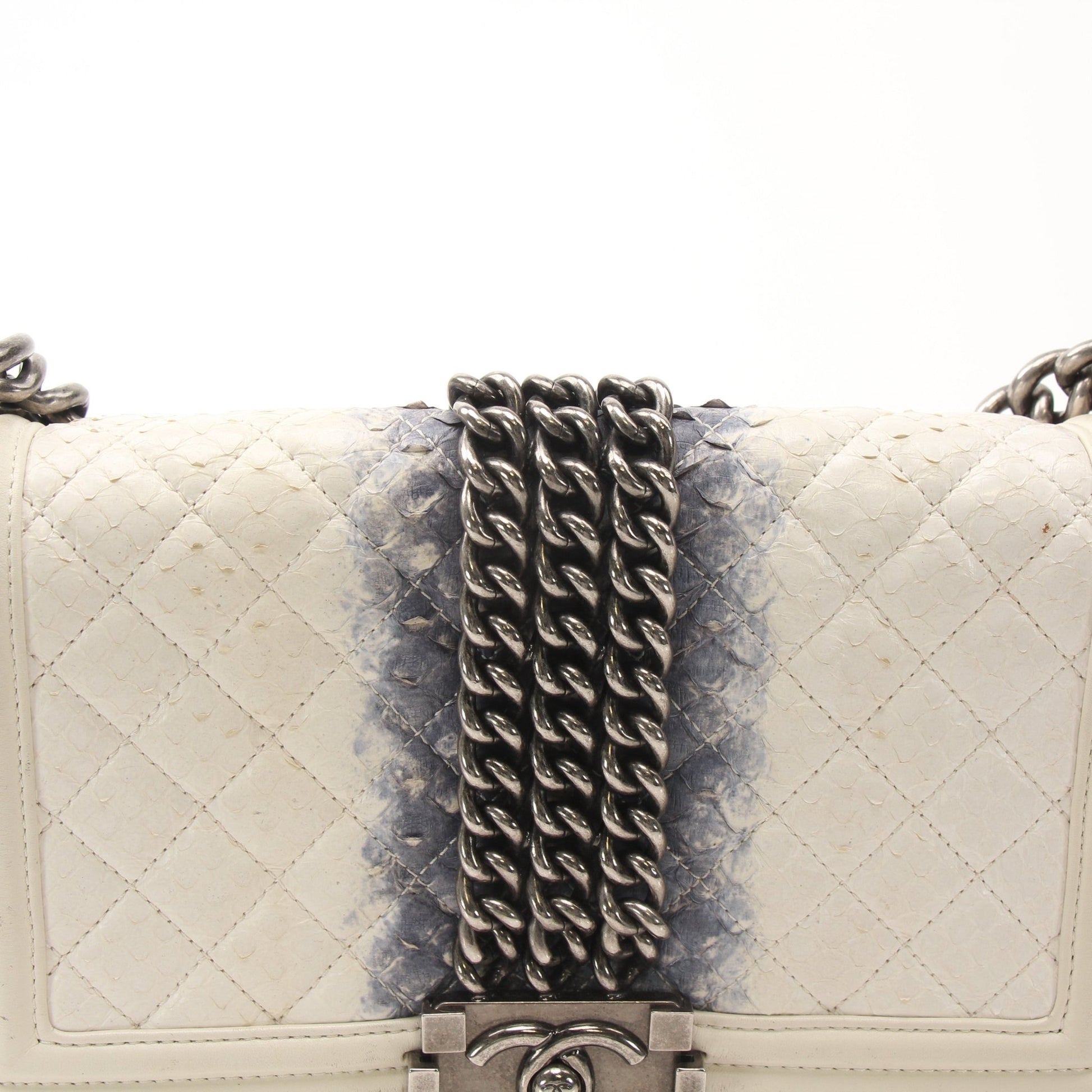 Gold & Beyond Chanel Quilted Mini Flap Bag handbag with gold chain strap and signature quilted design.