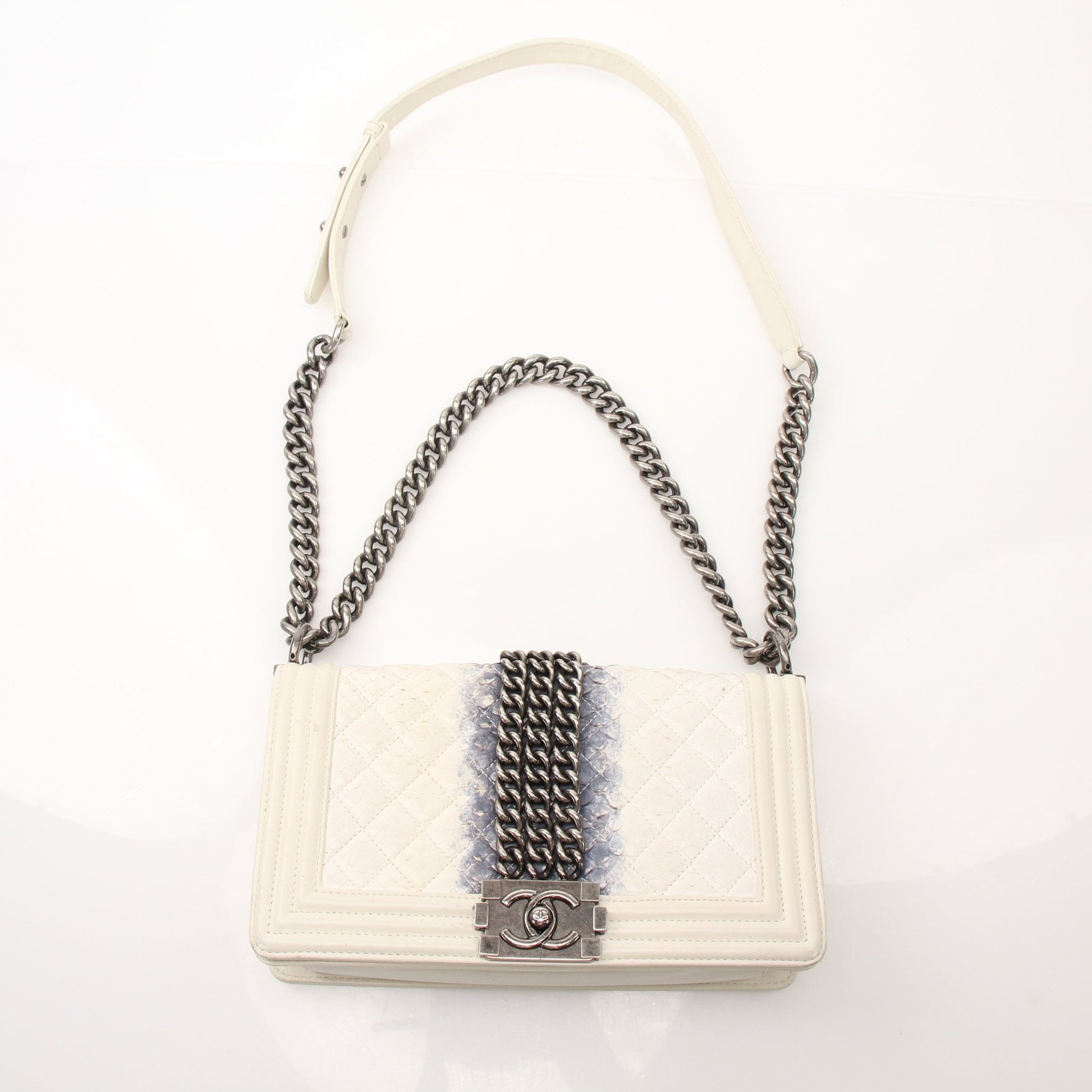Gold & Beyond Chanel quilted mini flap handbag with gold chain strap and signature quilting pattern.