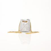 Gold & Beyond Chanel Micro Quilted Drawstring Pouch accessory with gold-tone hardware and quilted pattern on soft fabric.