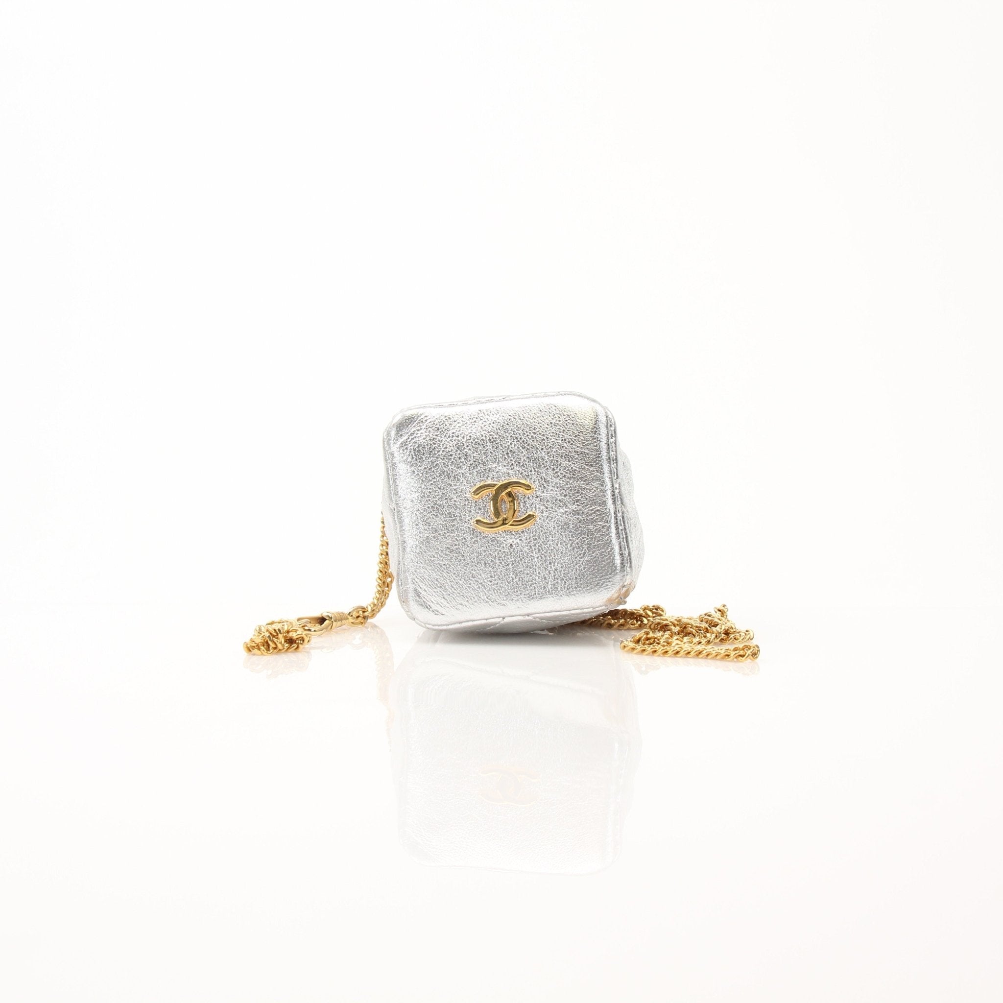 Gold & Beyond Chanel Micro Quilted Drawstring Pouch accessory with gold-tone drawstrings and signature quilted design.