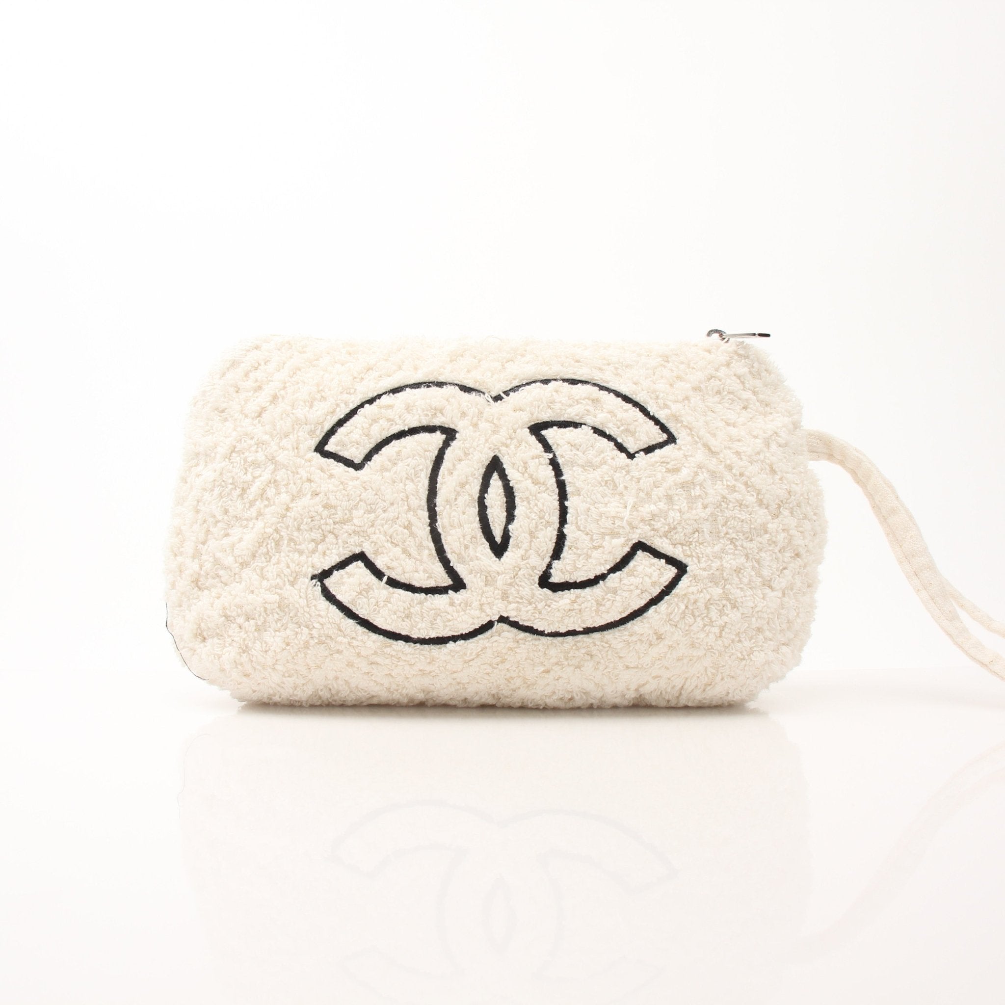 Gold & Beyond Chanel Terry Cloth CC Pochette handbag with beige fabric and gold-tone hardware, showcasing its compact, stylish design.