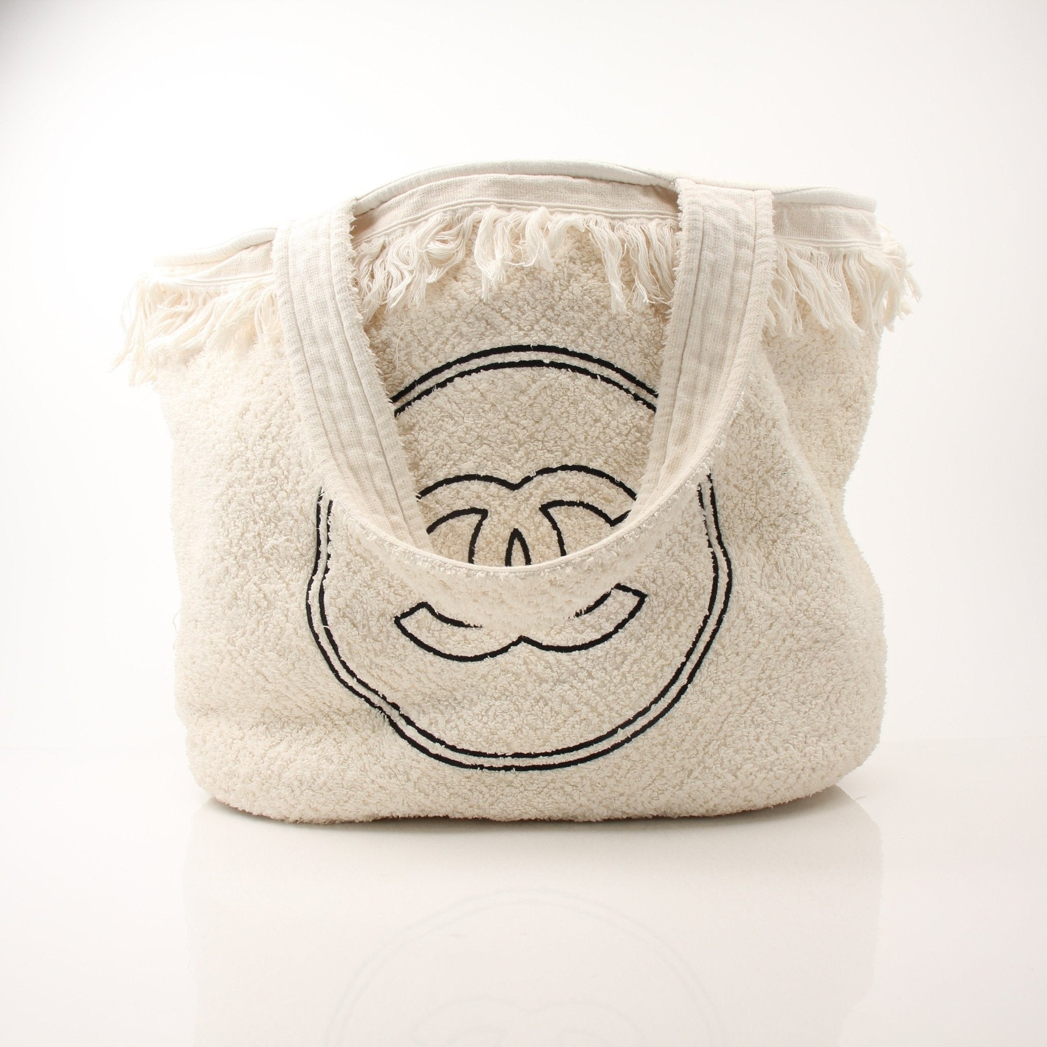Gold & Beyond Chanel Terry Cloth CC Beach Tote handbag with woven handles and spacious interior, perfect for beach or casual outings.