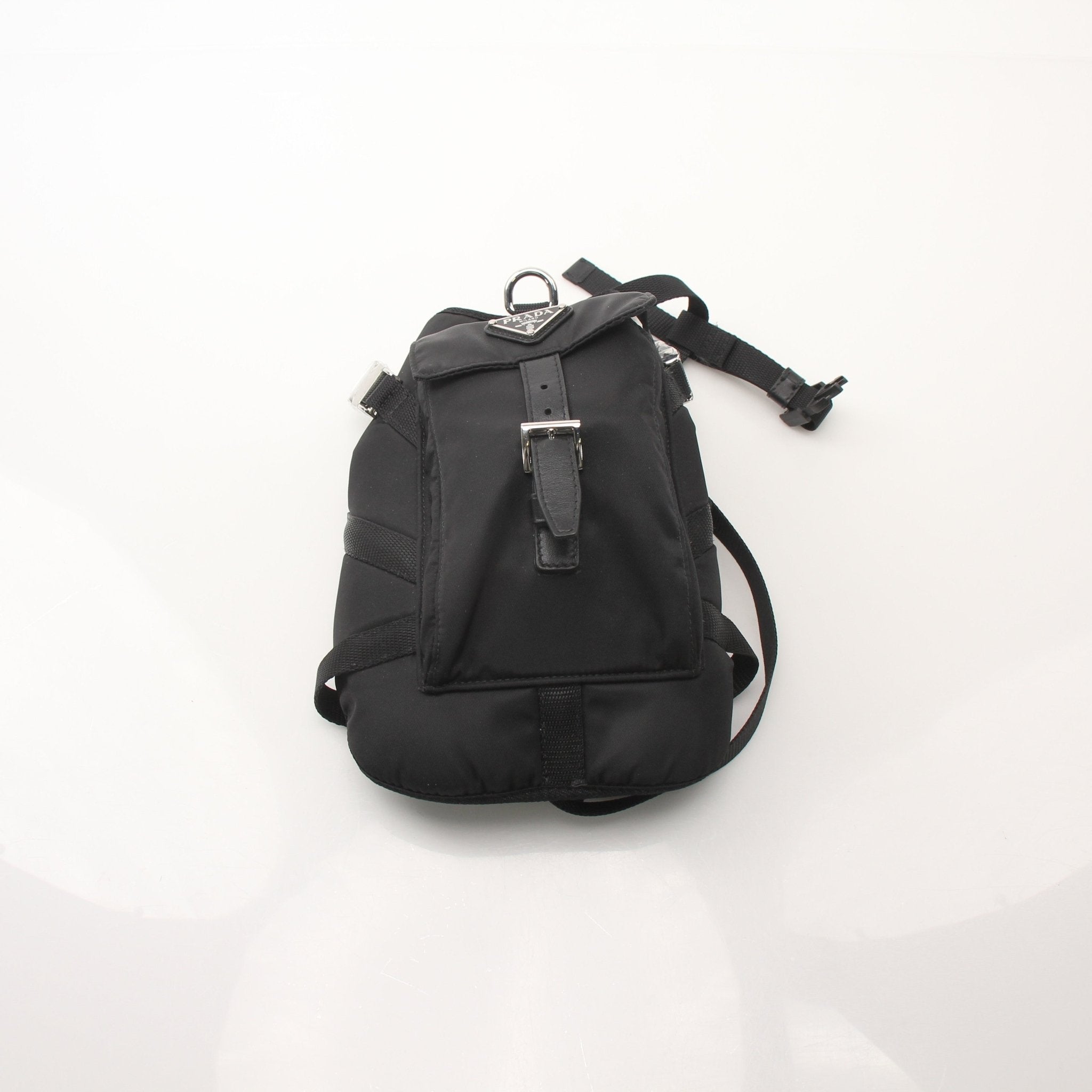 Prada black nylon dog harness with adjustable straps and metal hardware, designed for comfort and style.