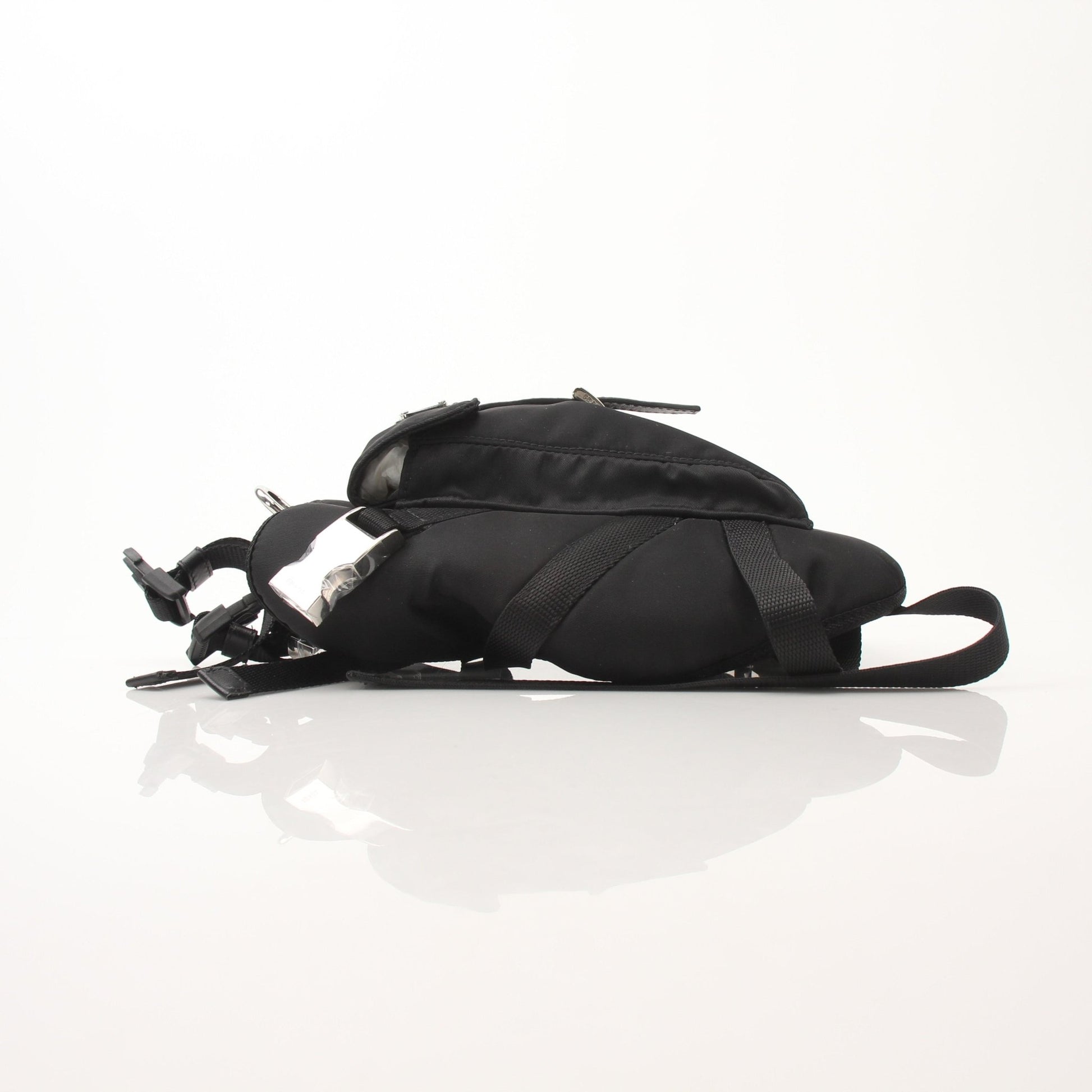 Black nylon dog harness from Prada Accessories by Gold & Beyond, featuring adjustable straps and secure buckle.