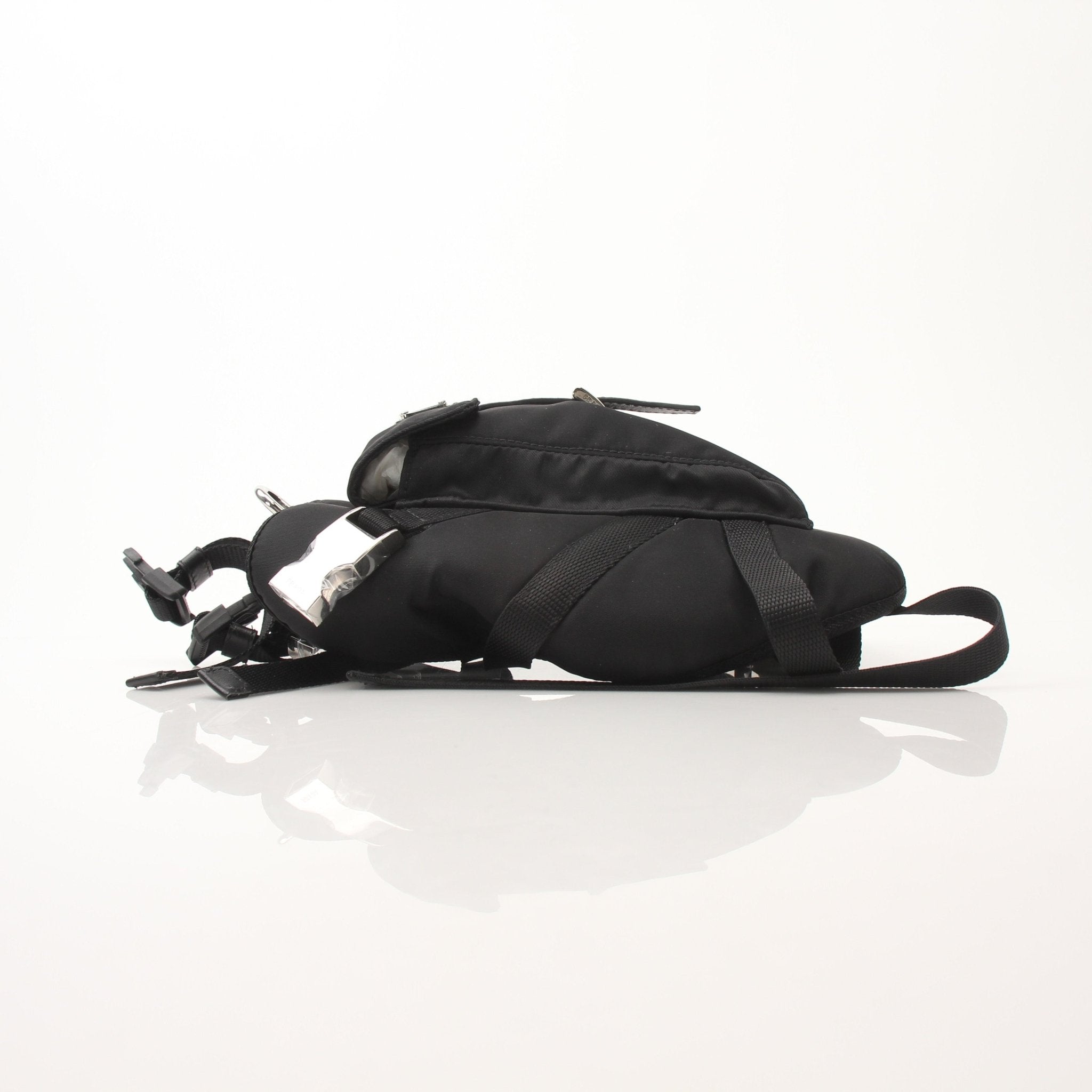 Black nylon dog harness from Prada Accessories by Gold & Beyond, featuring adjustable straps and secure buckle.