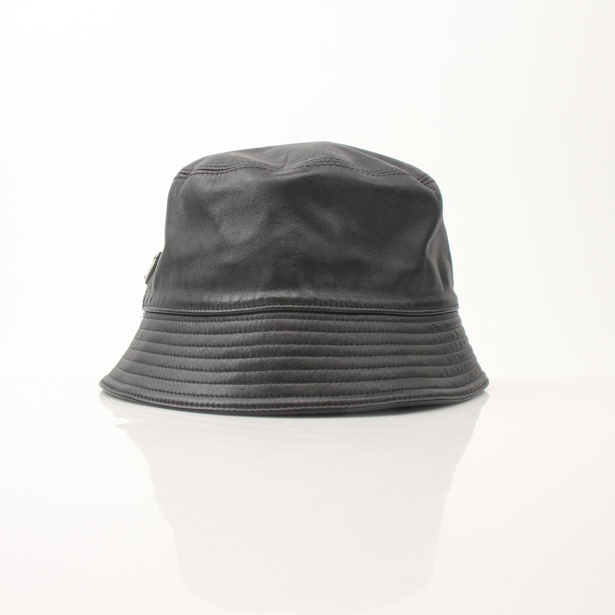 Prada black nappa leather bucket hat, stylish accessory with a smooth leather finish and wide brim, designed for fashion-forward looks.