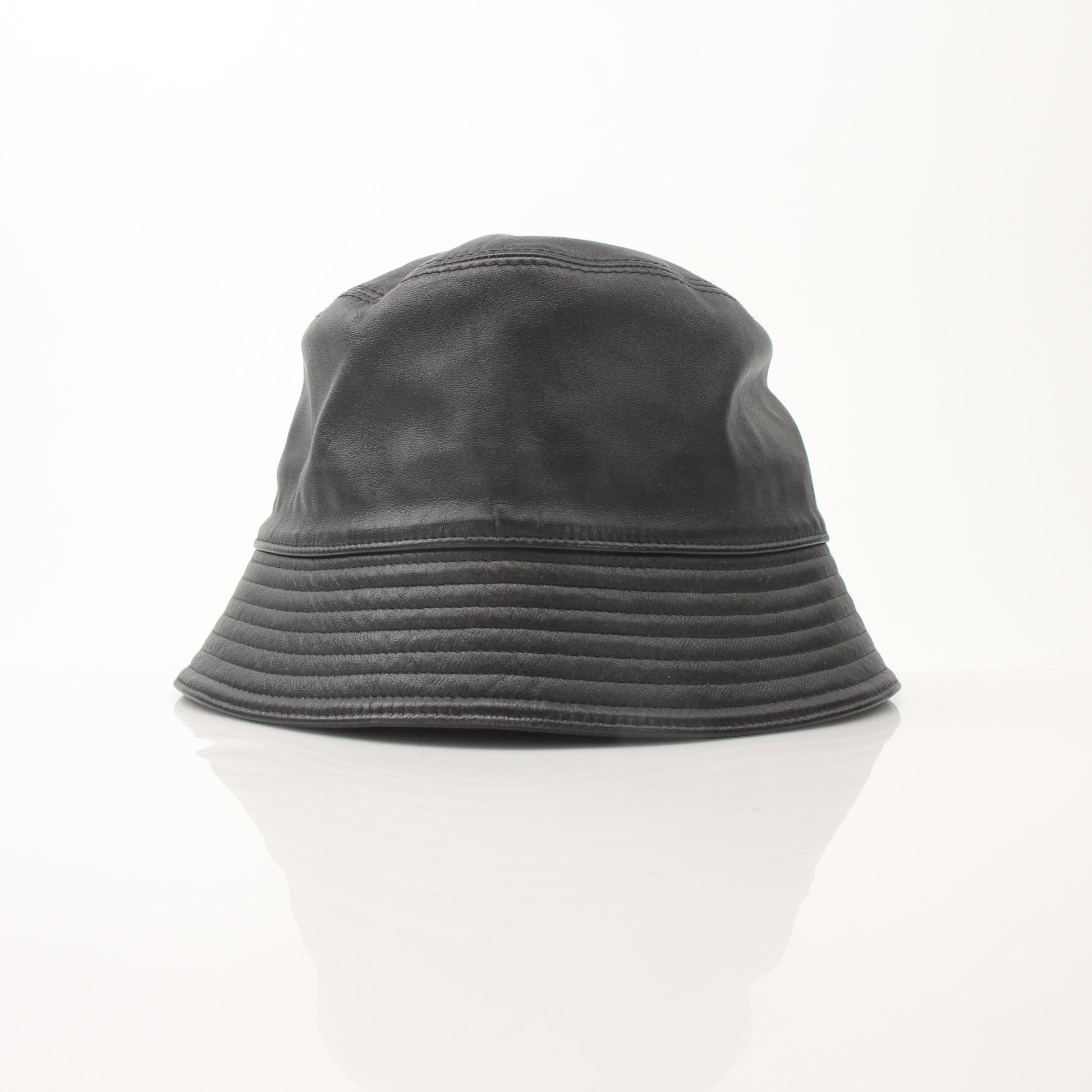 Prada black nappa leather bucket hat, stylish accessories with a smooth leather finish and wide brim for a modern look.