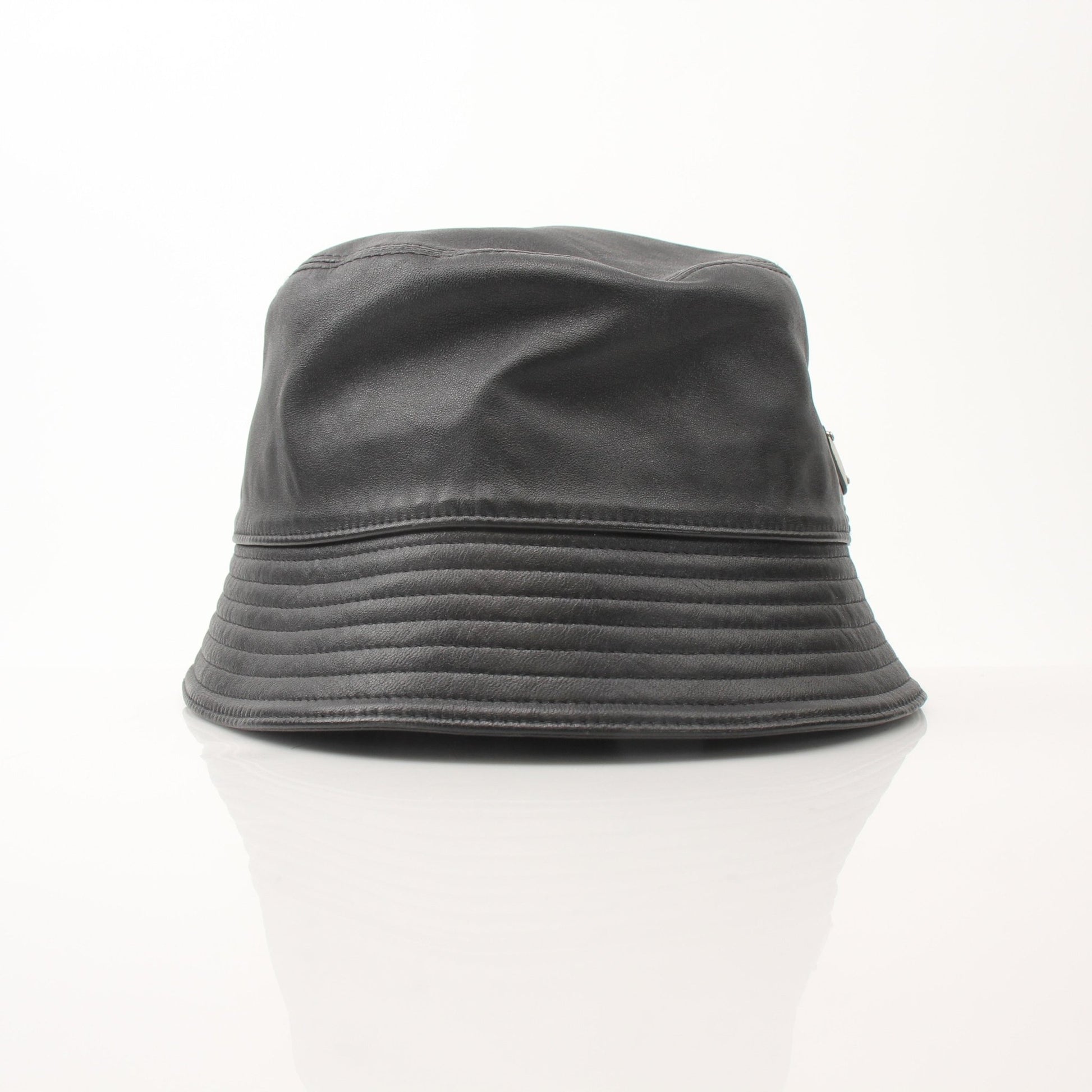 Black Prada Nappa leather bucket hat, stylish accessories with a sleek design, featuring the Prada logo and soft leather material.