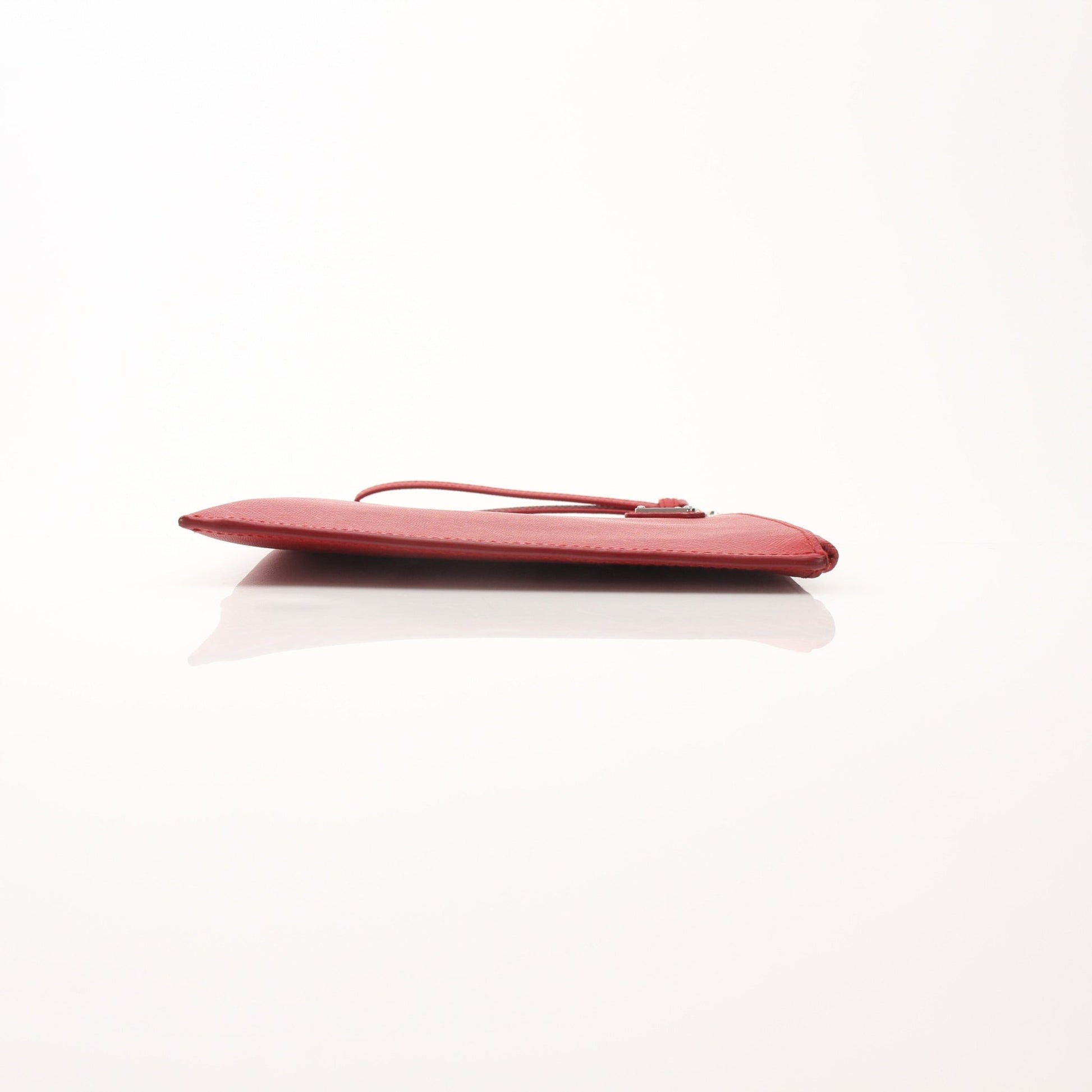 Red saffiano leather Prada wristlet pouch with gold-tone hardware, compact handbag perfect for essentials.