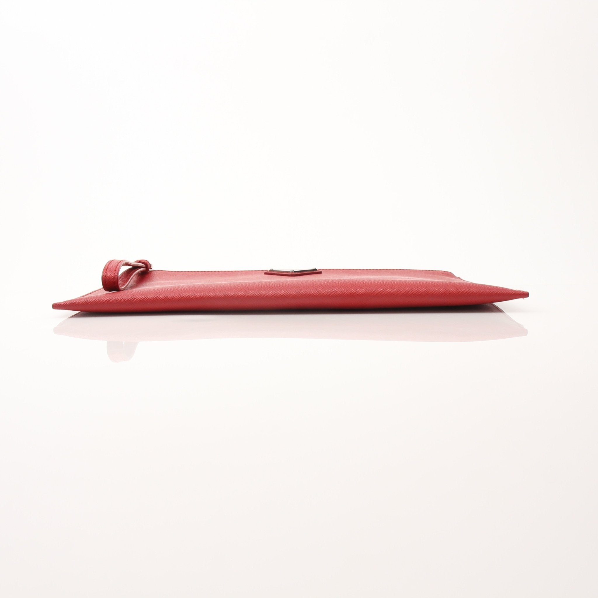 Prada red saffiano leather wristlet pouch with gold-tone hardware, compact handbag perfect for essentials.