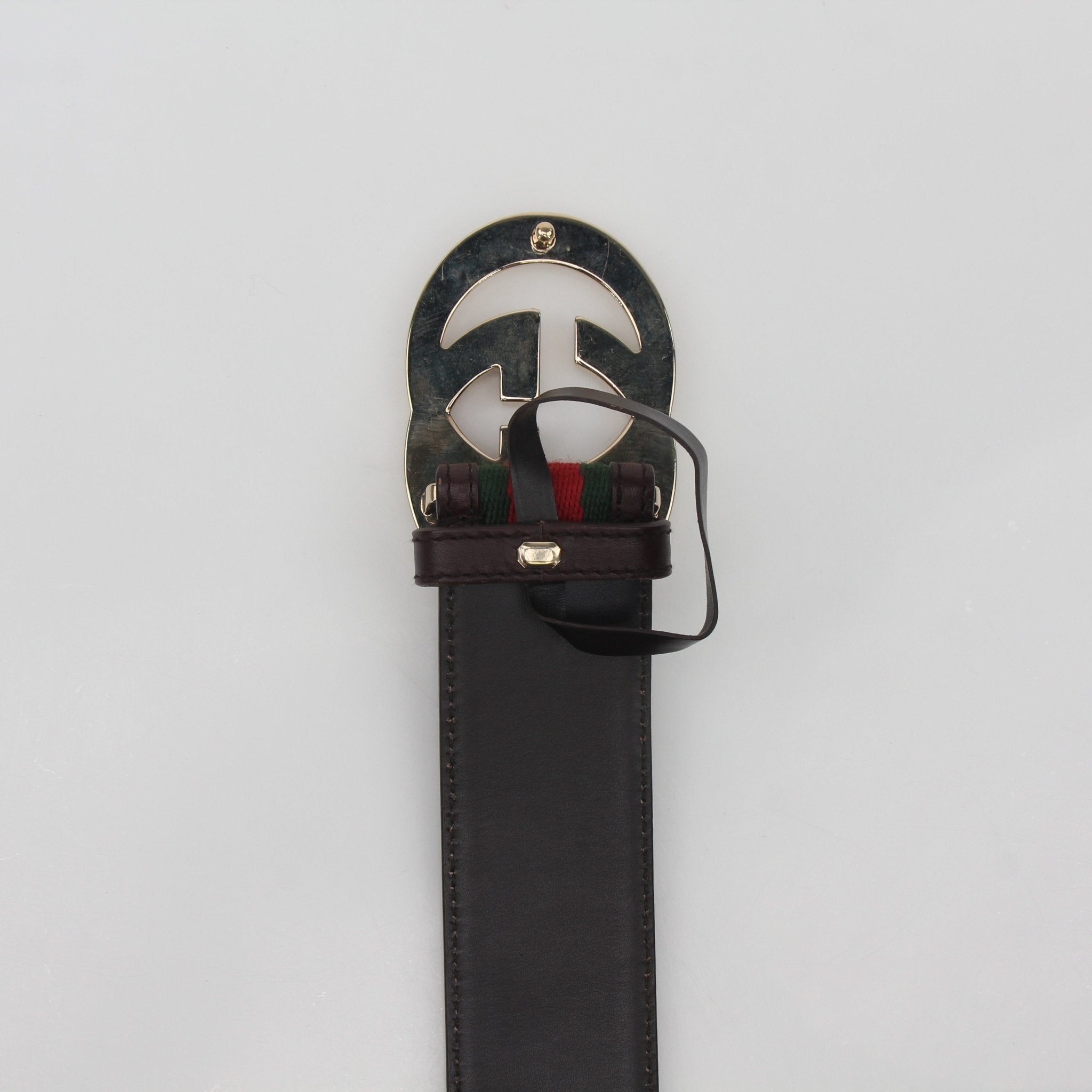 Gucci green and red interlocking G web belt with gold buckle, luxury accessories for men and women.