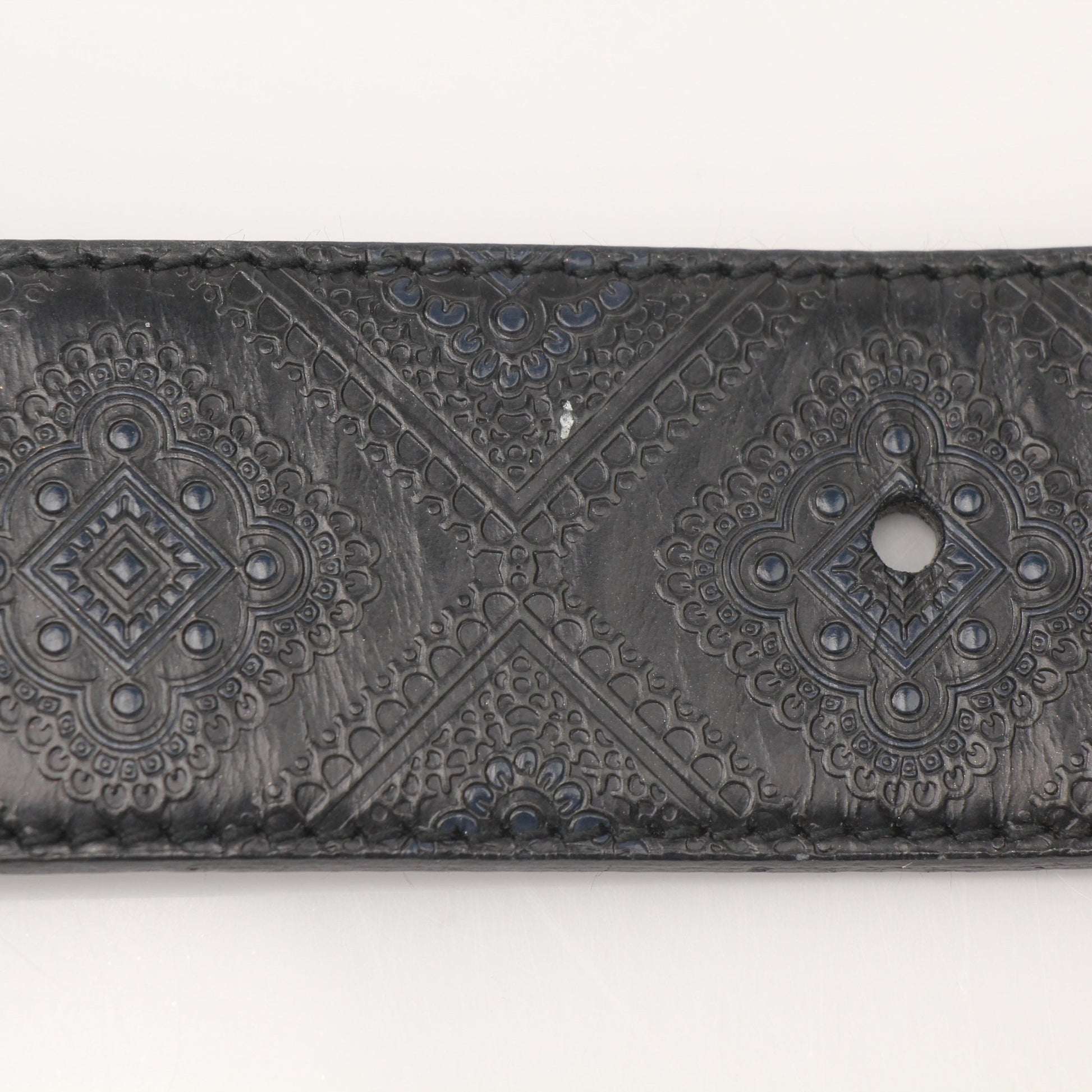 Prada black saffiano leather belt with gold hardware, stylish accessory for men and women, featuring a sleek, textured finish.
