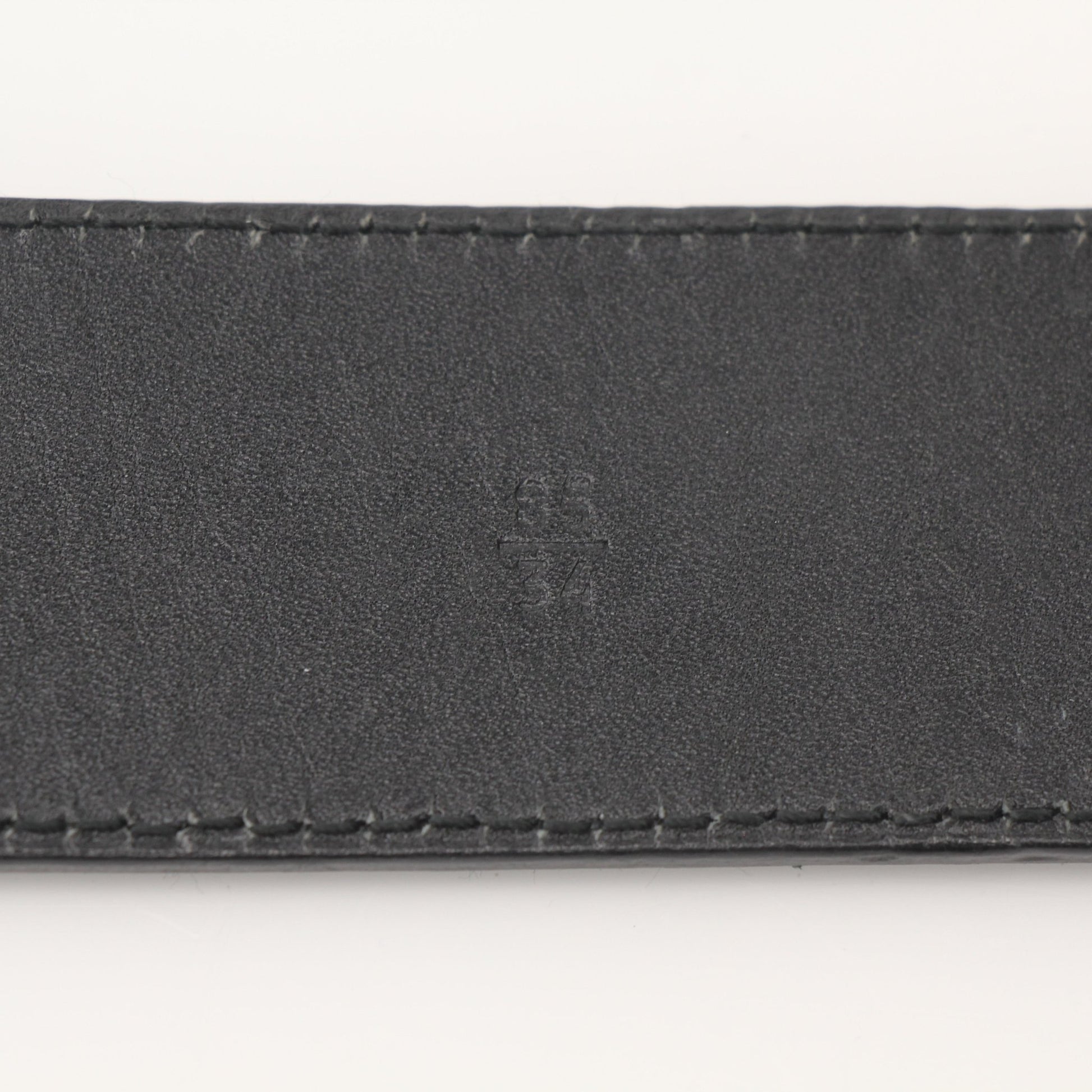 Black Prada Saffiano leather belt with gold-tone buckle, stylish accessories for men and women.