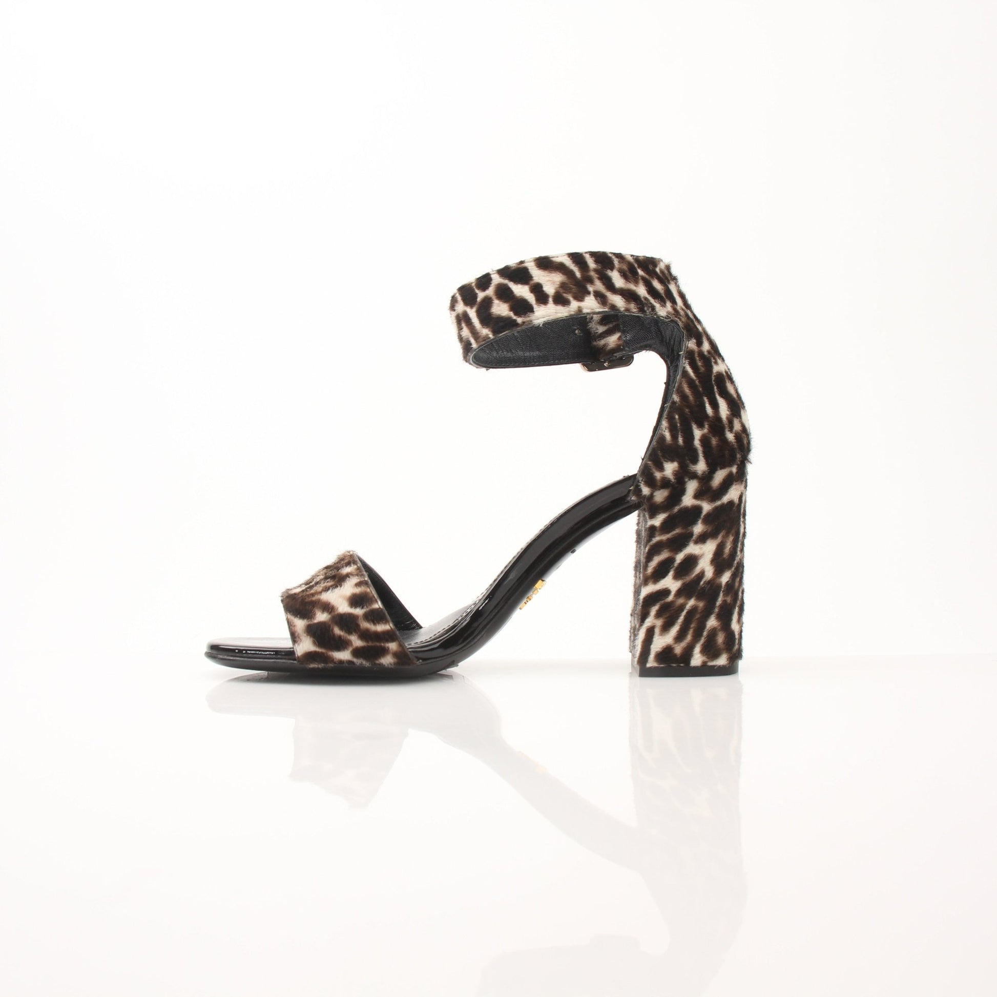 Prada pony hair leopard print block heel sandals featuring stylish design and comfortable footwear for women.