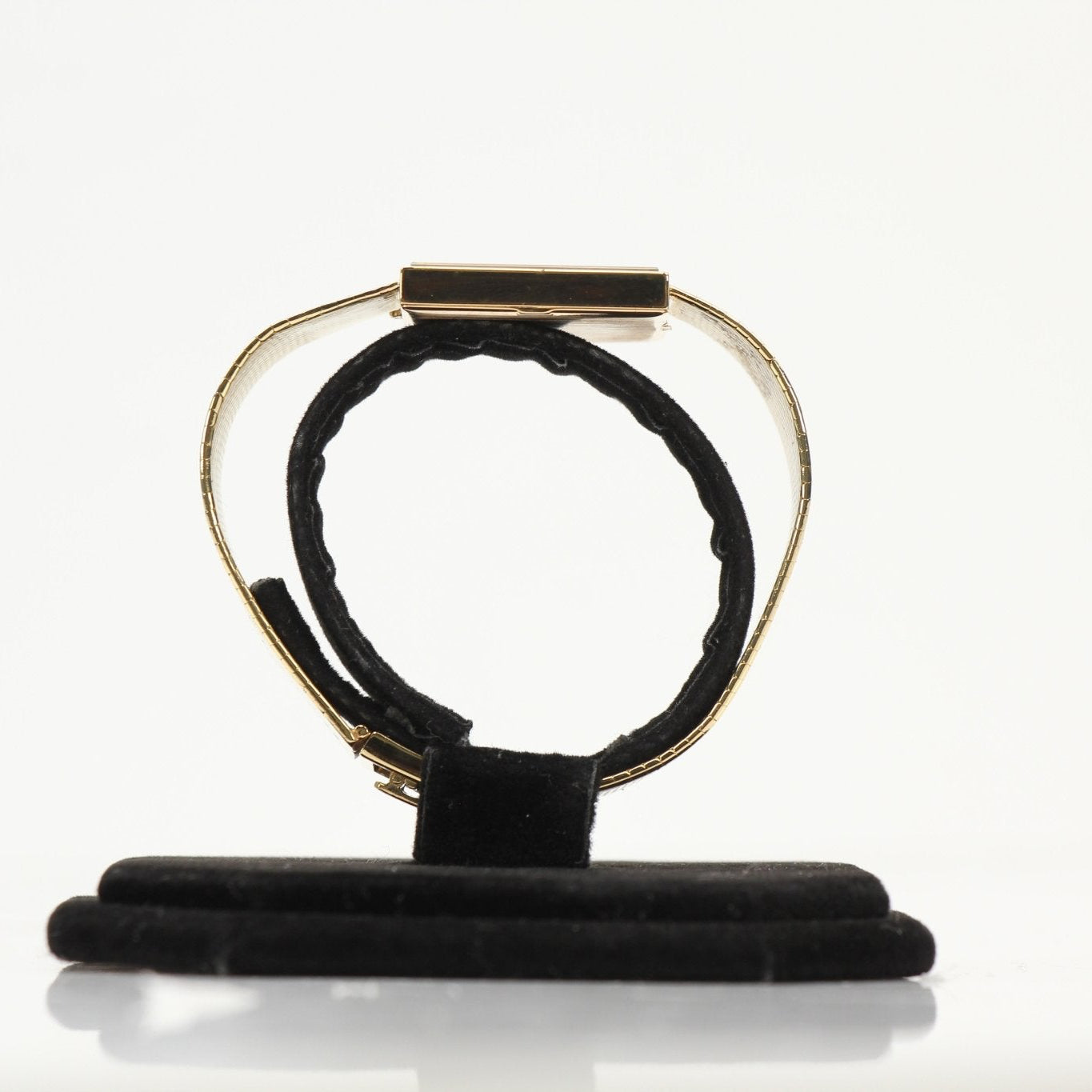 Gold & Beyond Patek Philippe square dress watch with a sleek gold case and elegant leather strap.