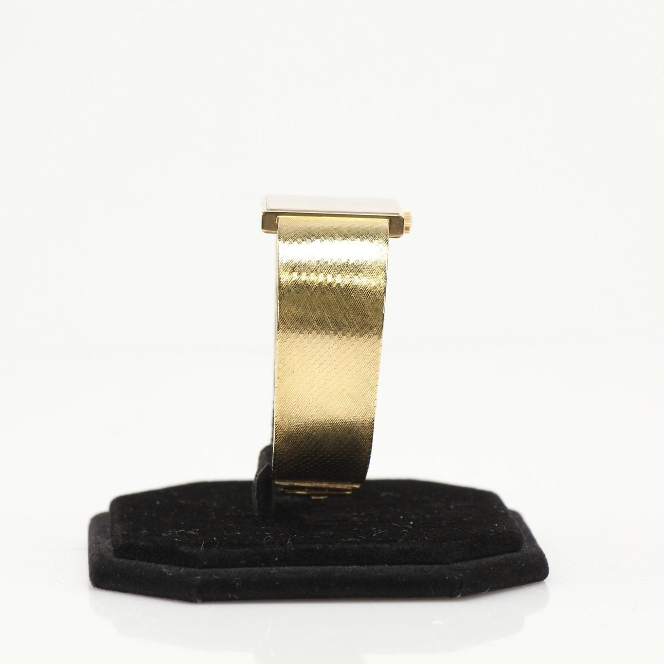 Gold & Beyond Patek Philippe square dress watch with gold case and leather strap, showcasing elegant timepiece design.