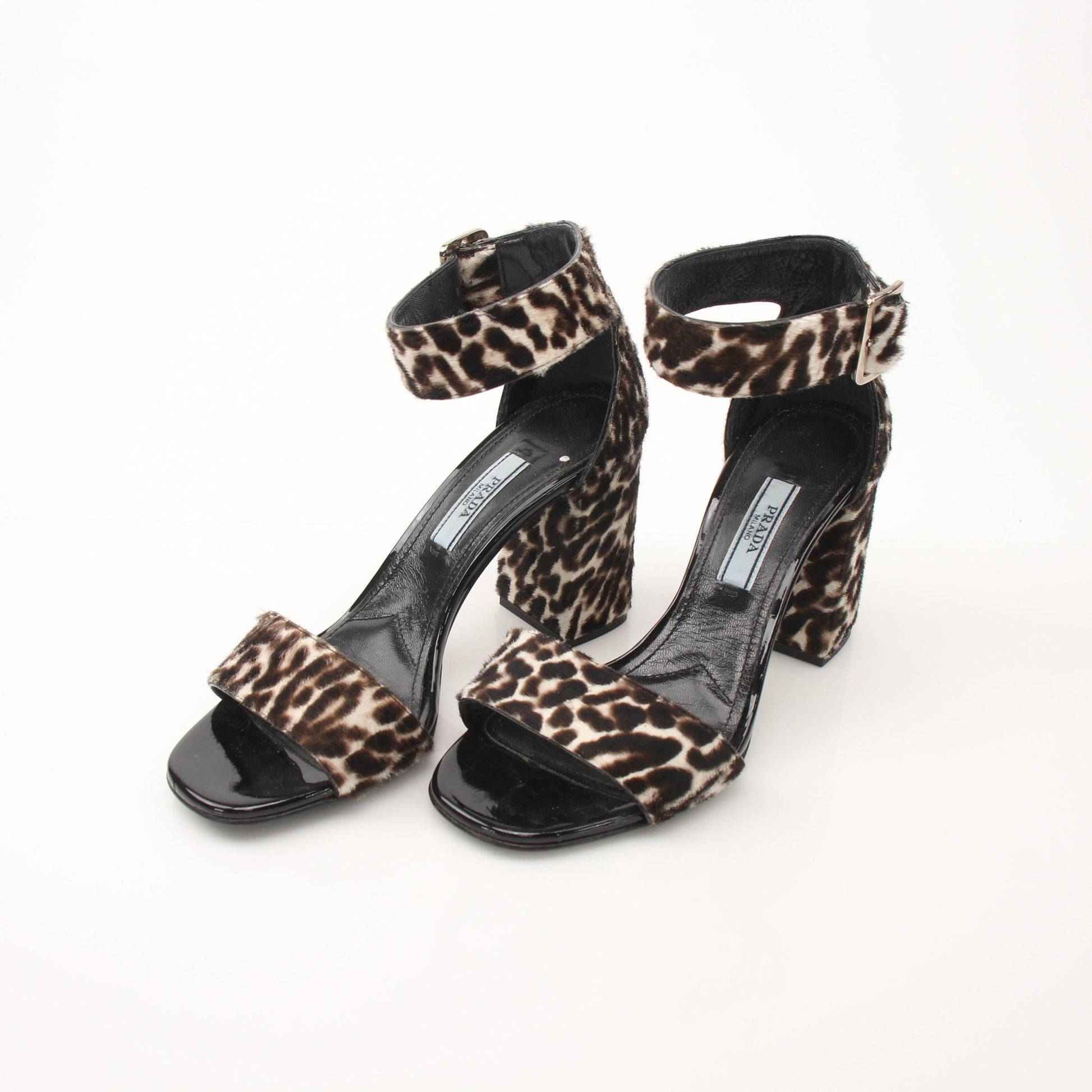 Prada Pony Hair Leopard Print Block Heel Sandals, stylish shoes with animal print and block heels, photographed against a neutral background.