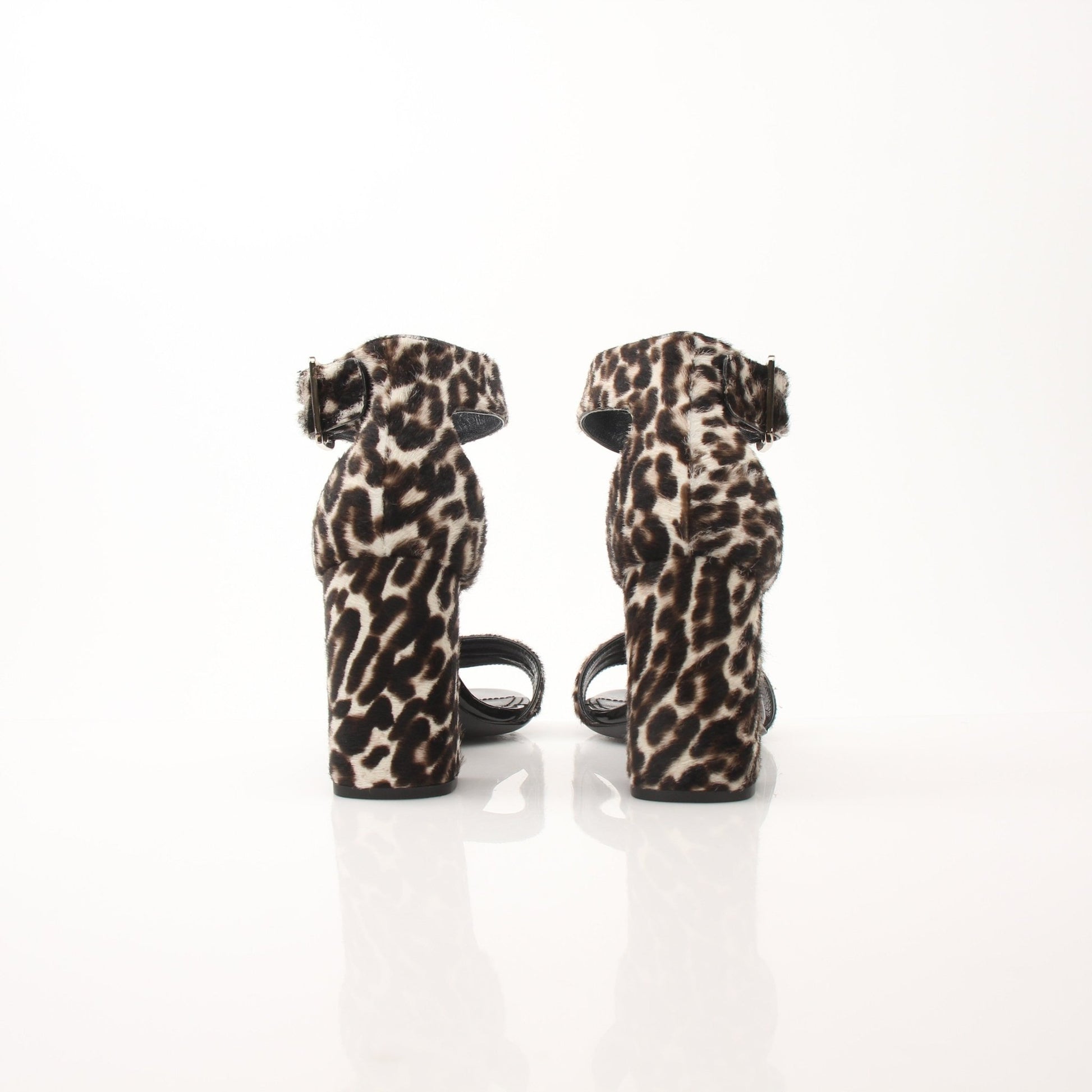 Prada pony hair leopard print block heel sandals featuring stylish design and comfortable footwear from Gold & Beyond.