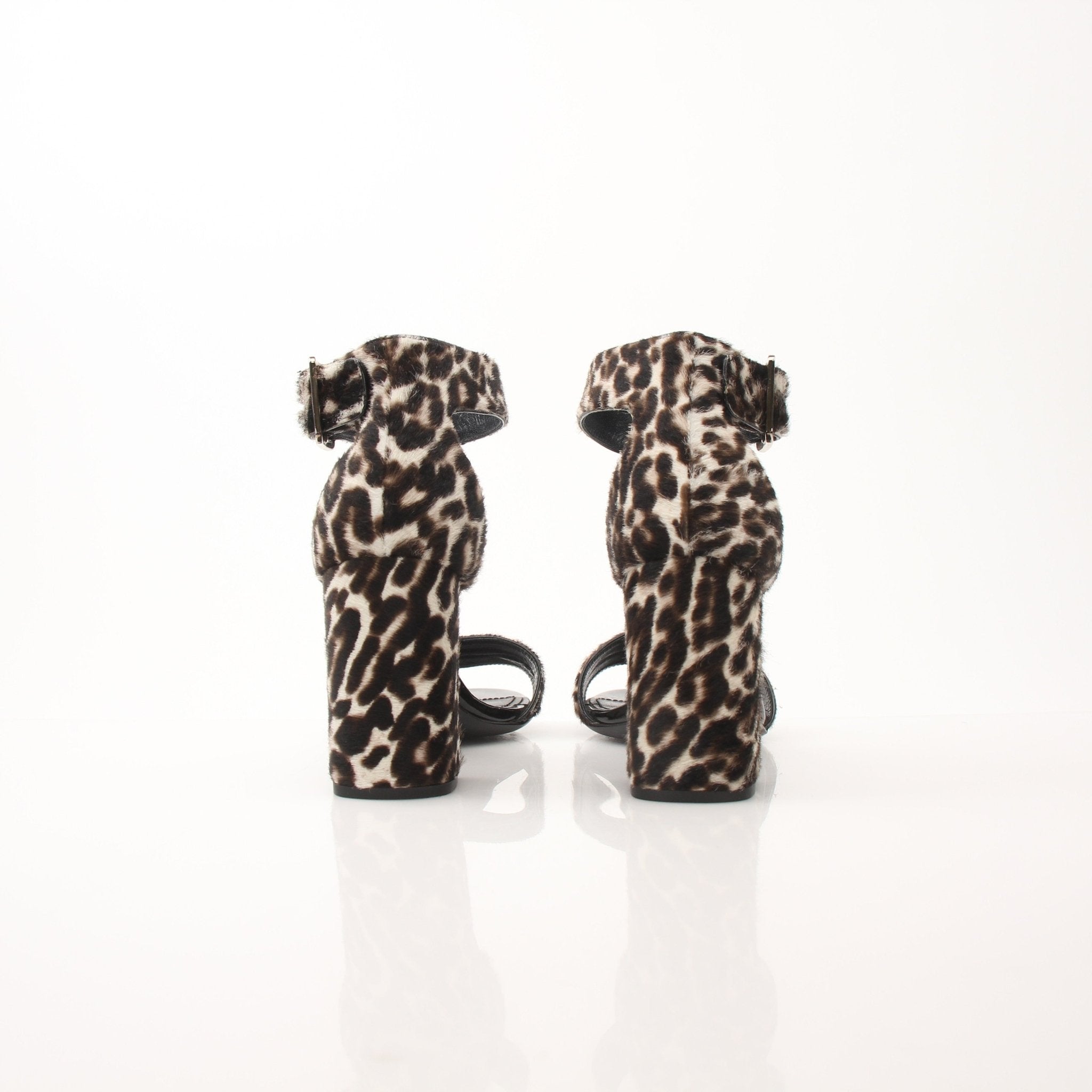 Prada pony hair leopard print block heel sandals featuring stylish design and comfortable footwear from Gold & Beyond.