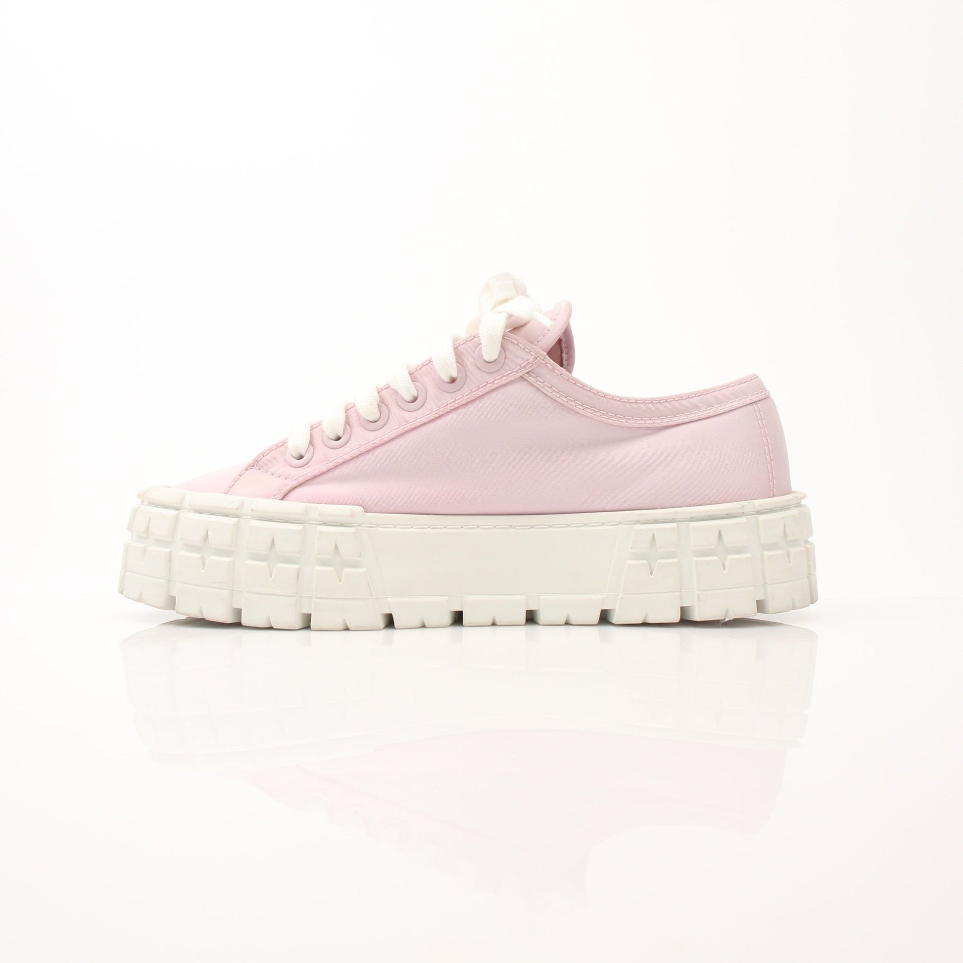 Prada pink nylon double wheel platform sneakers with black accents and chunky soles, stylish shoes by Gold & Beyond.