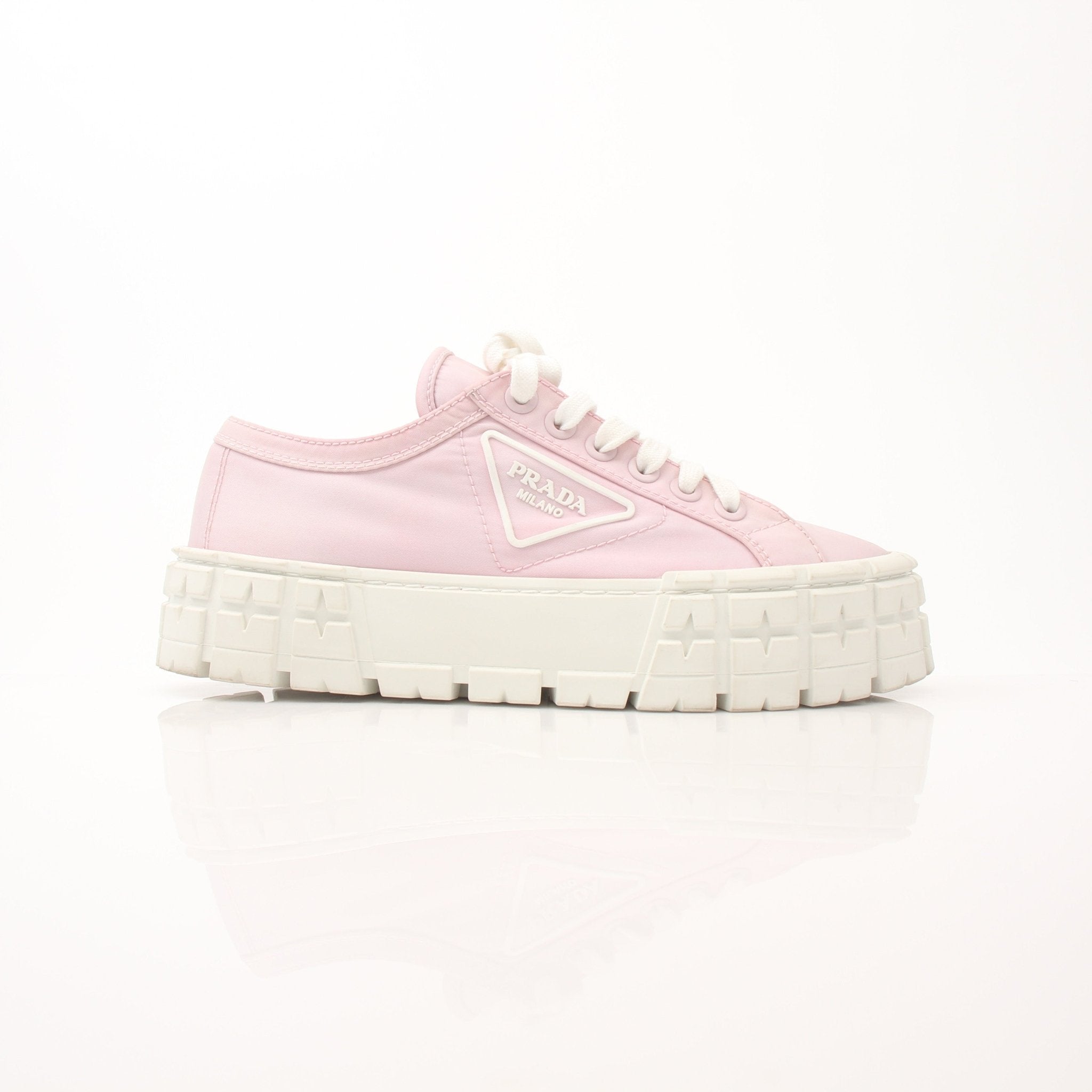 Prada pink nylon double wheel platform sneakers with white soles and laces, stylish shoes from Gold & Beyond.