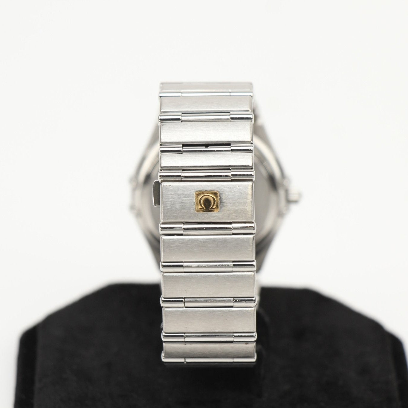 Gold & Beyond Omega Constellation Chronometer watch with stainless steel bracelet and blue dial, showcasing elegant design and precise timekeeping.