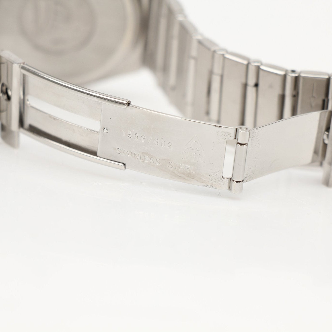 Omega Constellation chronometer watch by Gold & Beyond with a sleek stainless steel bracelet and a detailed dial.