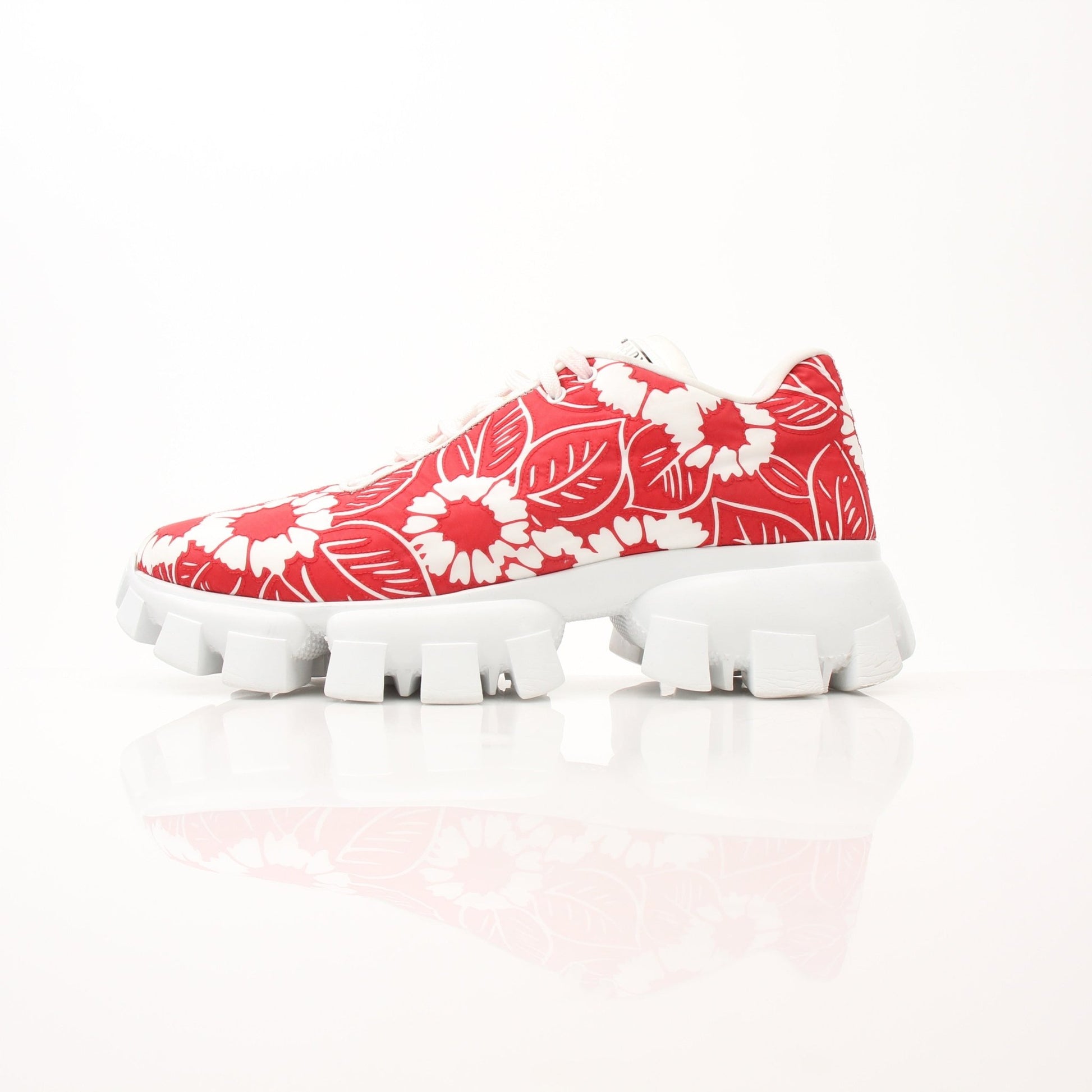 Gold & Beyond Prada Floral Monolith Lug Sole Sneakers size 41 featuring colorful floral design and sturdy lug outsole.