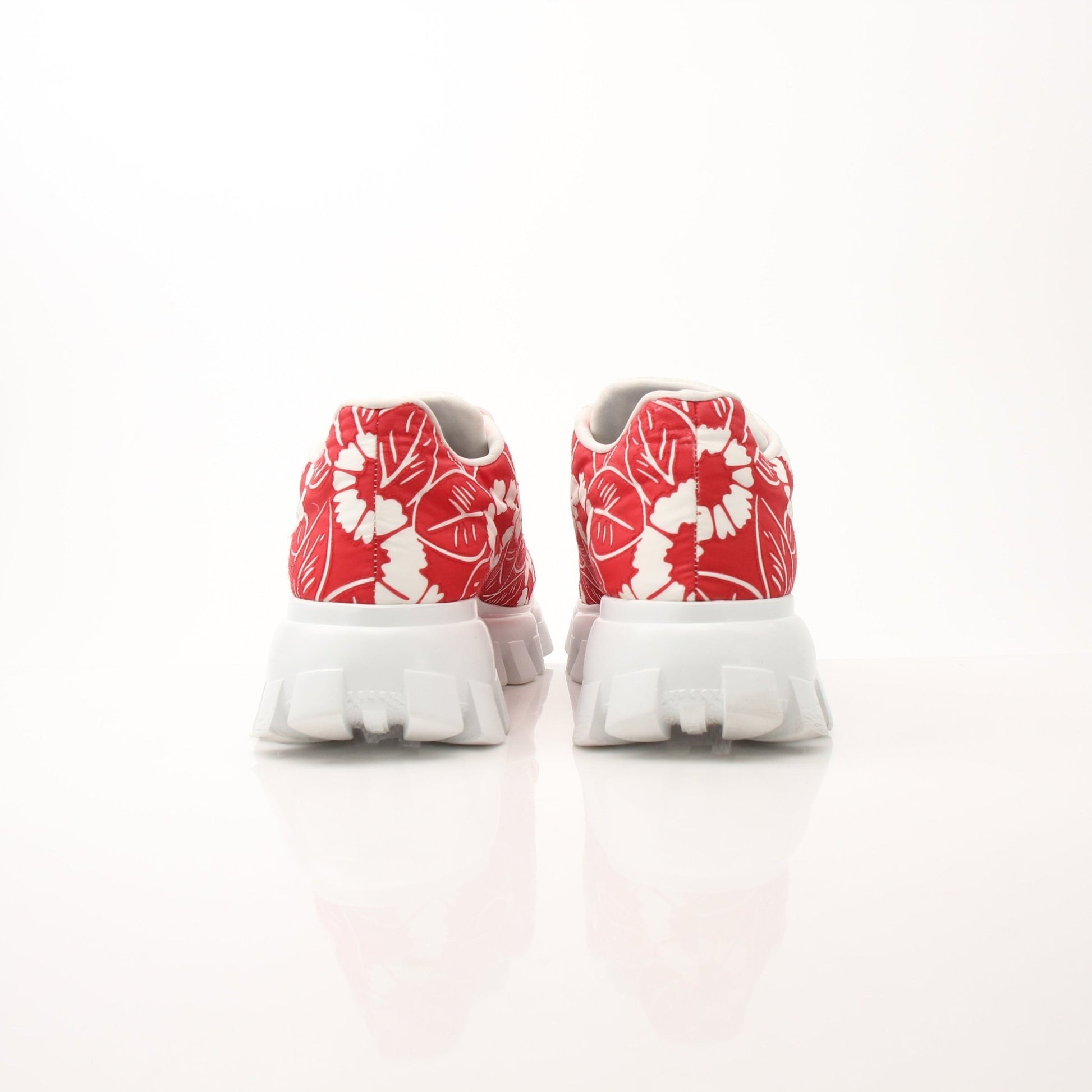 Prada Floral Monolith Lug Sole Sneakers in size 41, stylish shoes with floral design and chunky lug sole, by Gold & Beyond.
