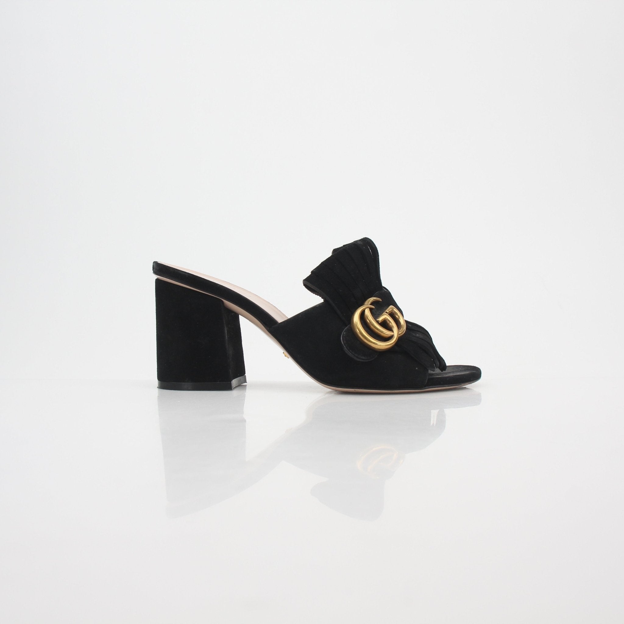 Gucci Black GG Marmont Fringe Slide Sandals with gold accents, featuring a stylish open-toe design and fringe details.