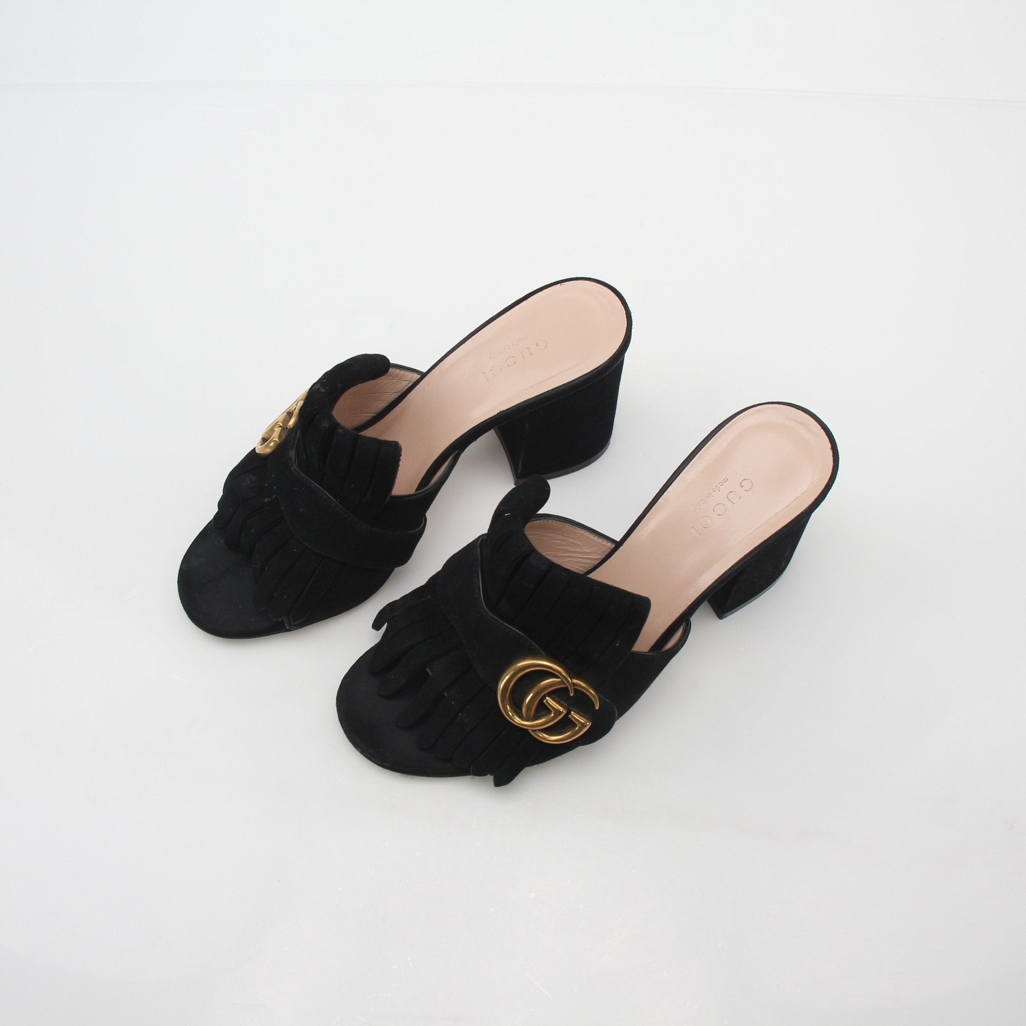 Gucci Black GG Marmont Fringe Slide Sandals with gold accents, open-toe design, and stylish fringe detailing.