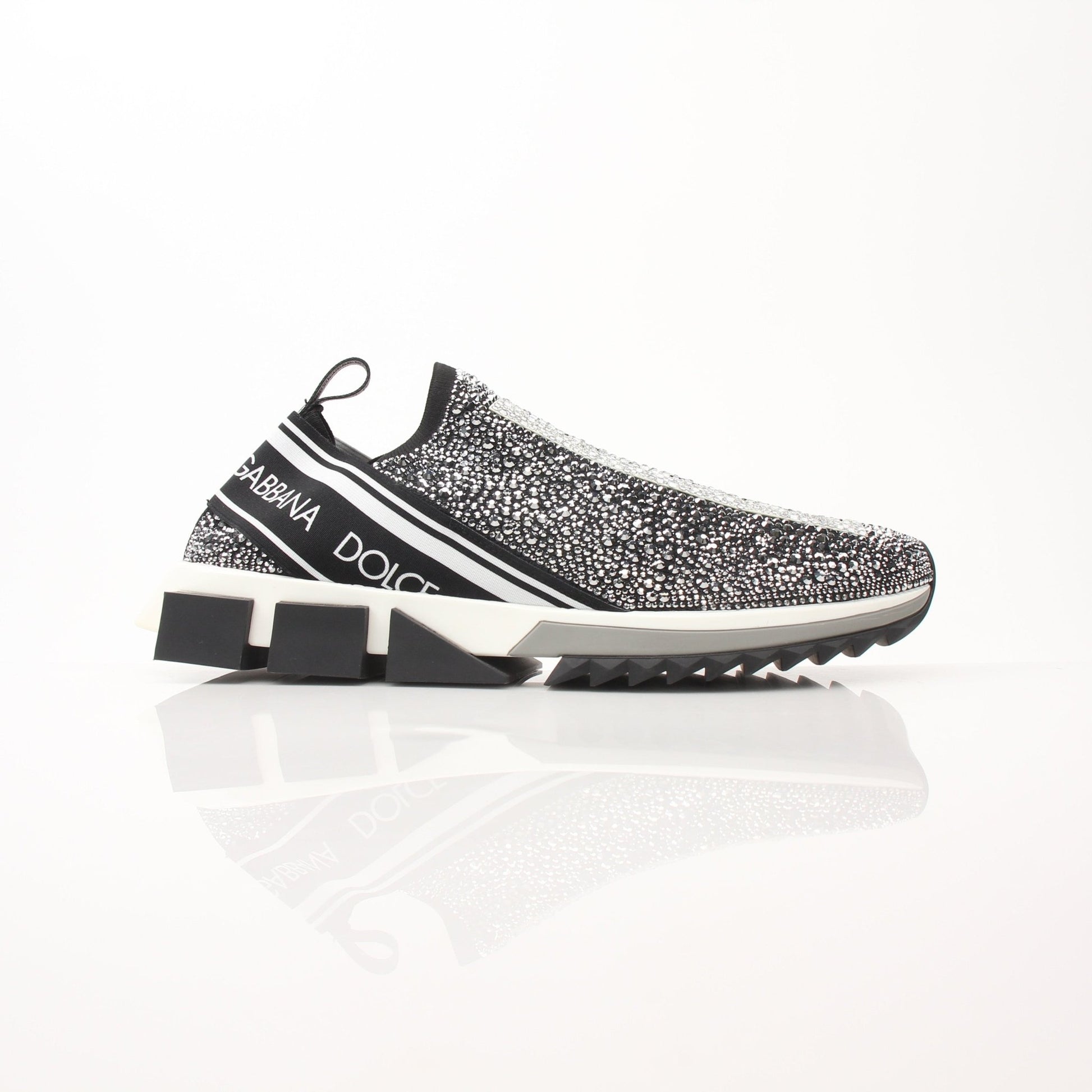 Dolce & Gabbana Sorrento Crystal Logo slip-on sneakers with decorative crystals, casual shoes from Gold & Beyond.