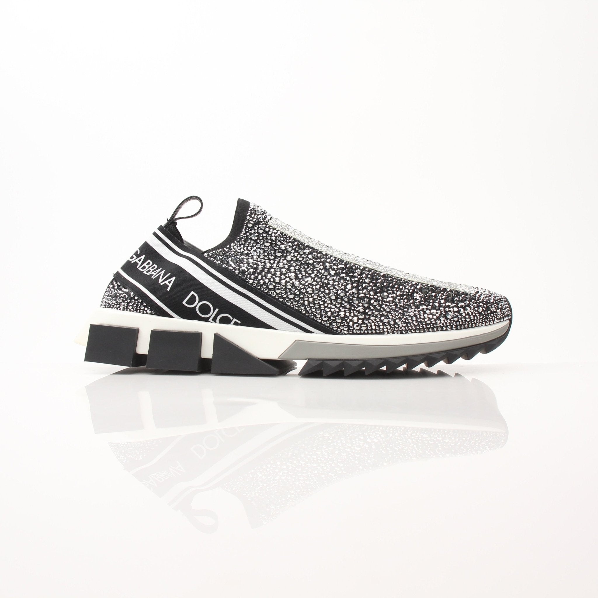 Dolce & Gabbana Sorrento Crystal Logo slip-on sneakers with decorative crystals, casual shoes from Gold & Beyond.
