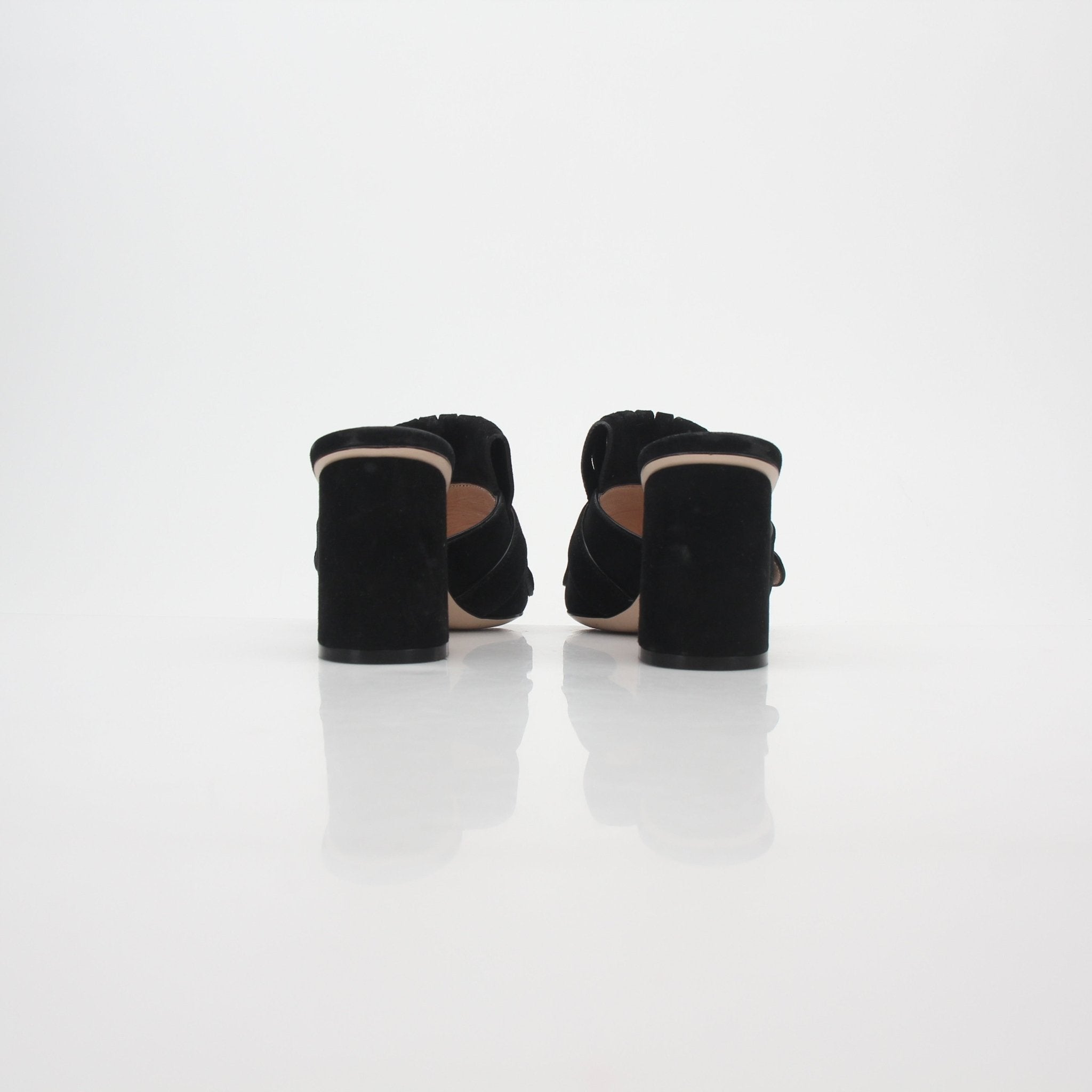 Gucci Black GG Marmont Fringe Slide Sandals with gold-tone accents, showcasing stylish open-toe shoes with fringe details.