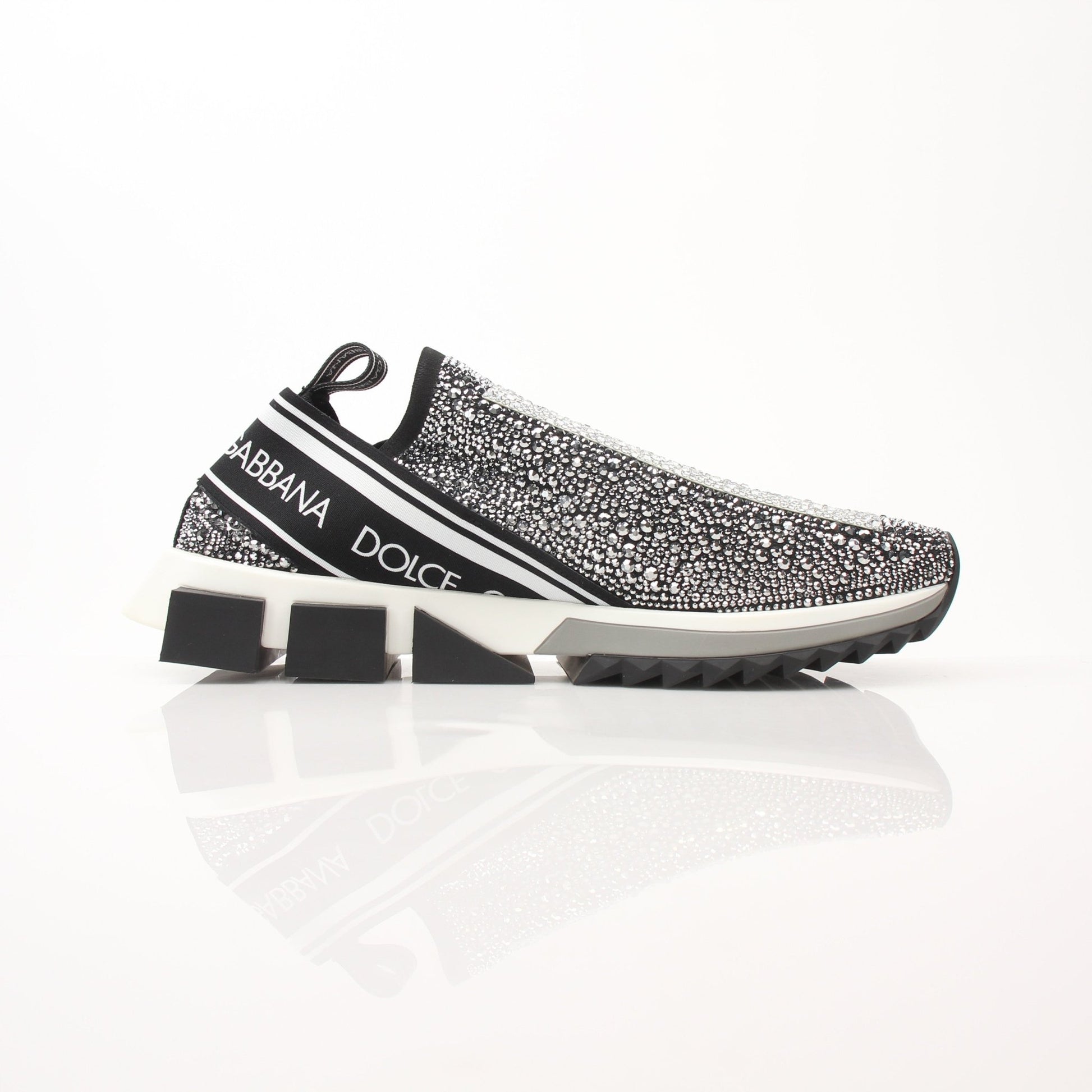 Gold & Beyond Dolce & Gabbana Sorrento Crystal Logo slip-on sneakers with crystal embellishments and sleek design.