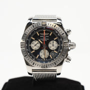 Gold & Beyond Breitling Super Avenger Chronograph watch with black dial, stainless steel case, and chronograph subdials.