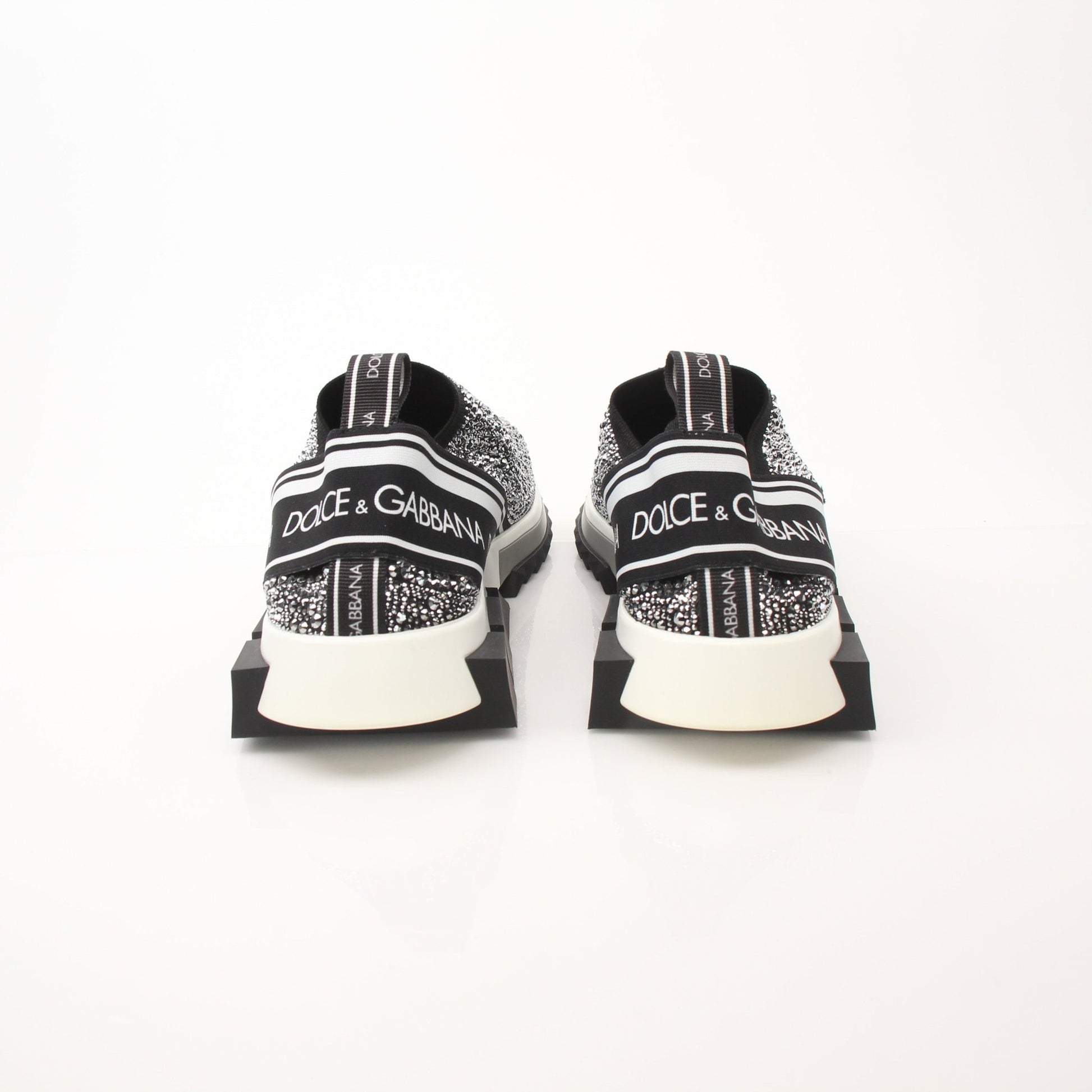 Dolce & Gabbana Sorrento Crystal Logo slip-on sneakers with embellished details and sleek design, casual shoes for stylish comfort.