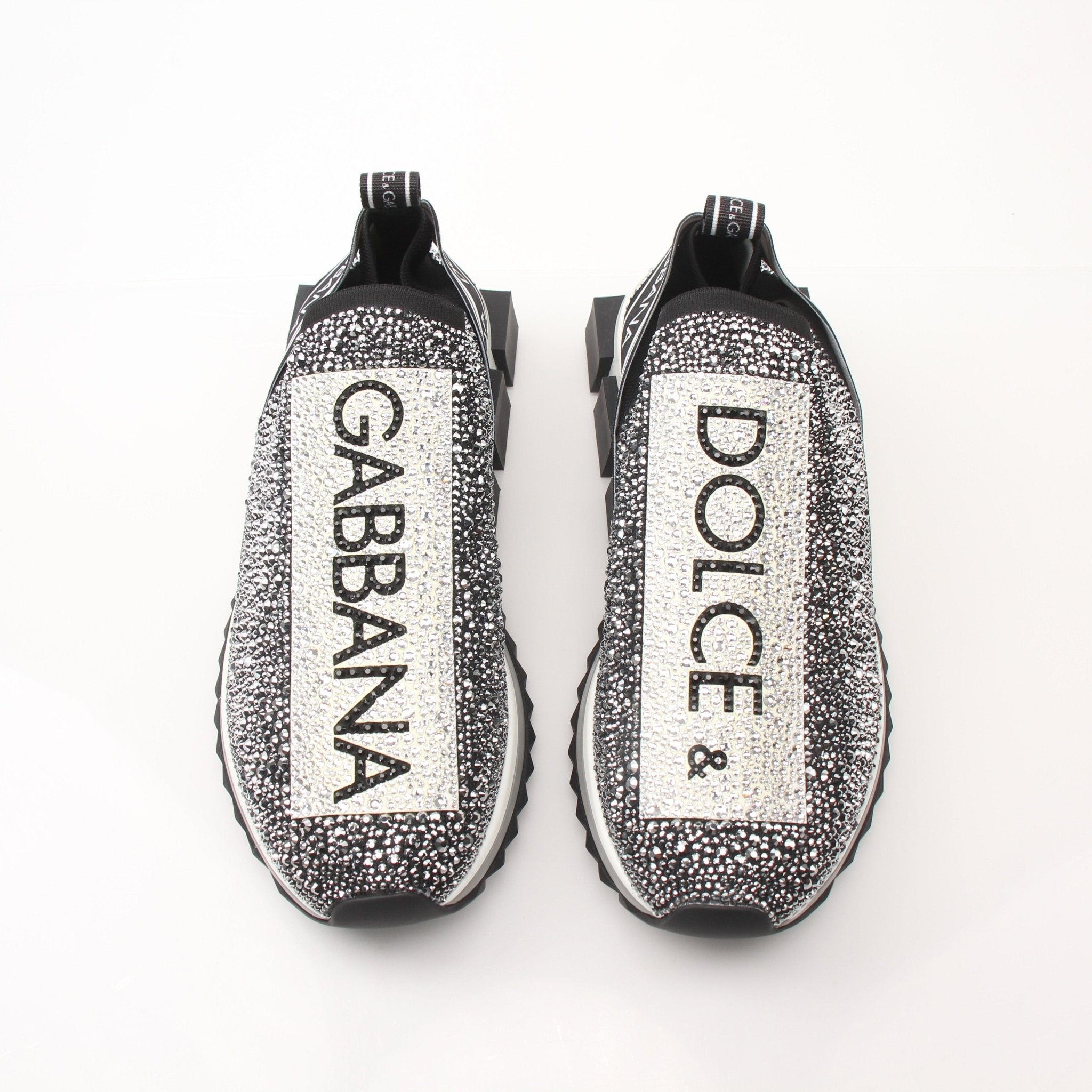 Gold & Beyond Dolce & Gabbana Sorrento Crystal Logo Slip-On Sneakers, stylish shoes with crystal logo embellishments.