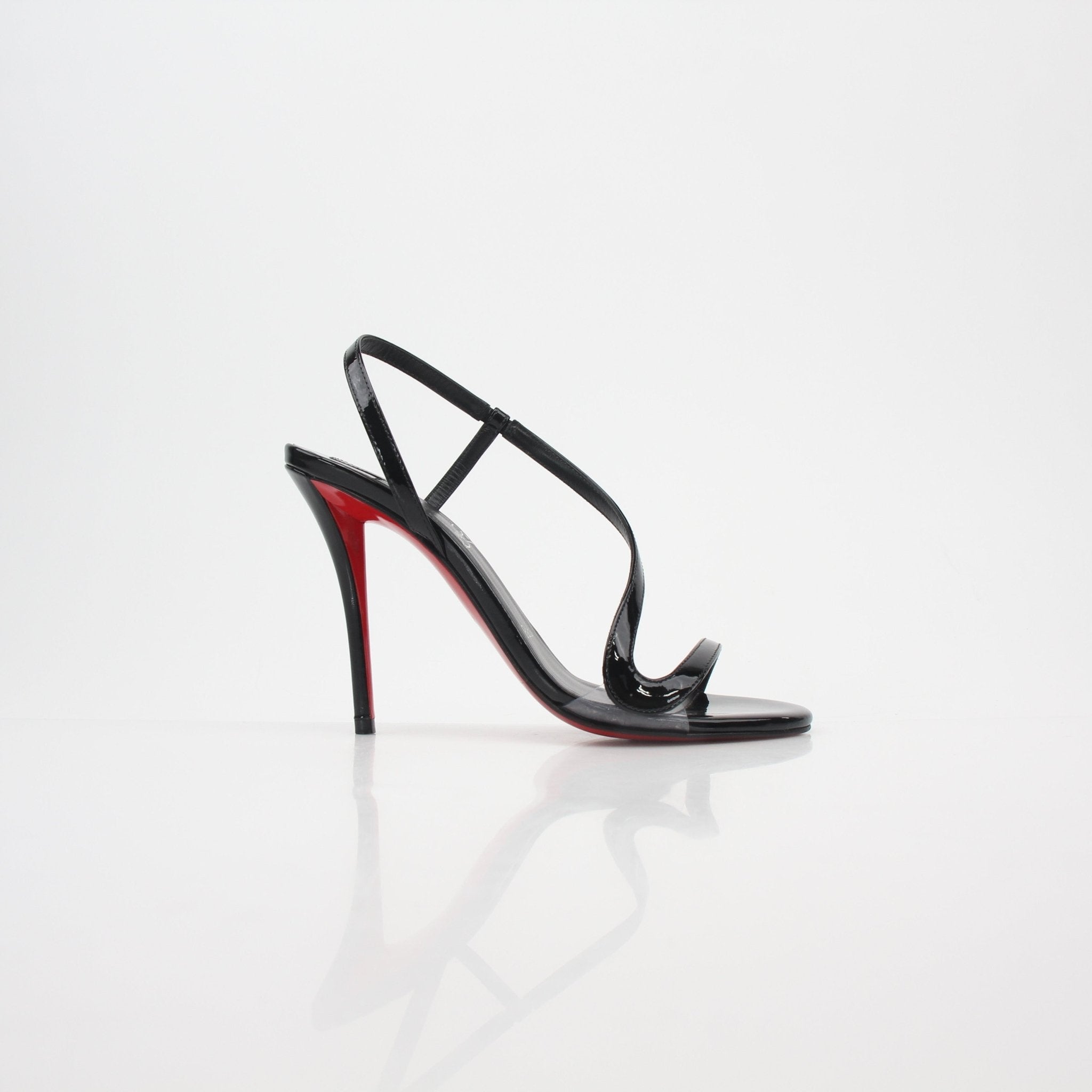 Black Christian Louboutin Rosa Z 100 patent leather heels with red sole details, displayed on a neutral background.