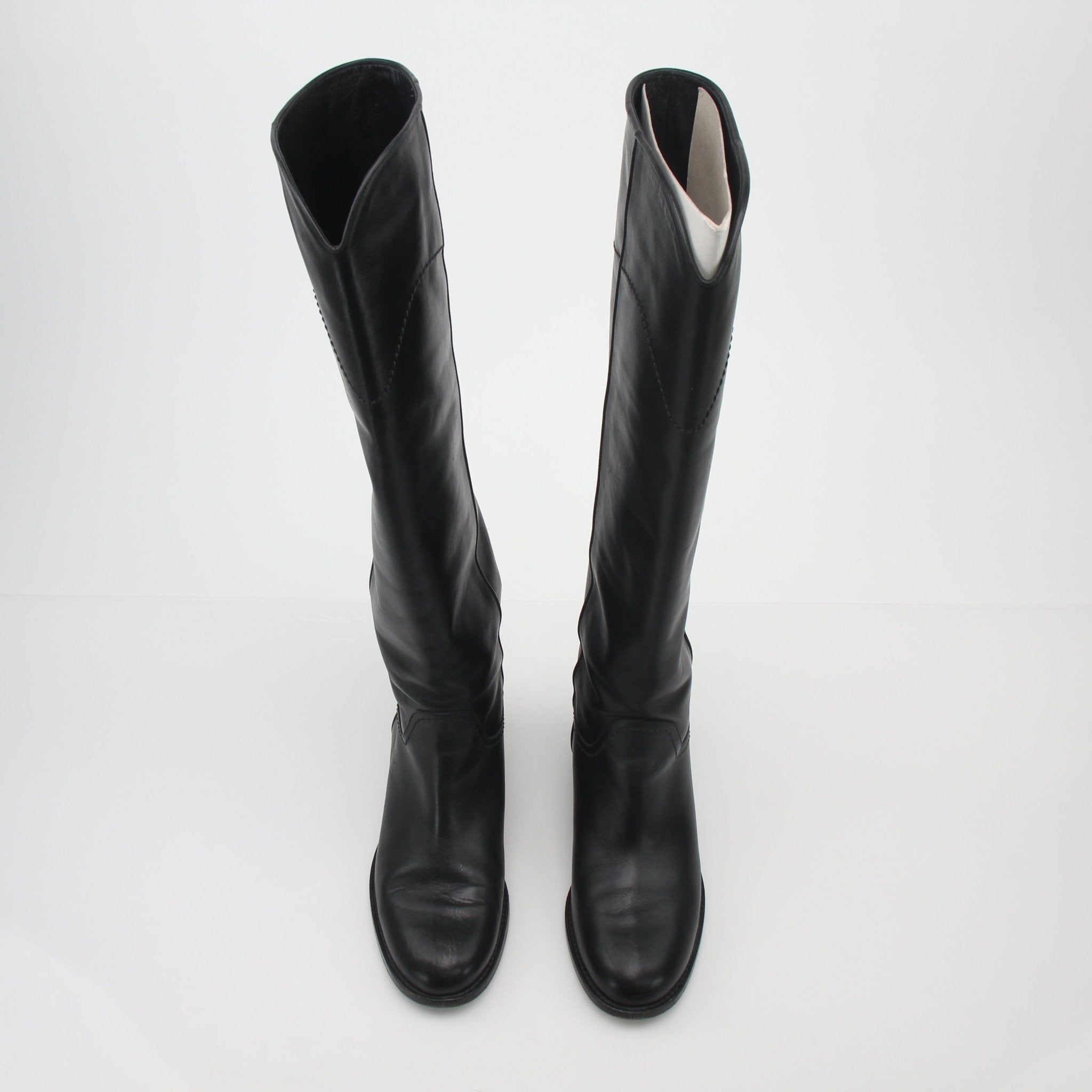 Gold & Beyond Chanel black leather CC knee-high riding boots, stylish shoes with classic design and sleek finish.