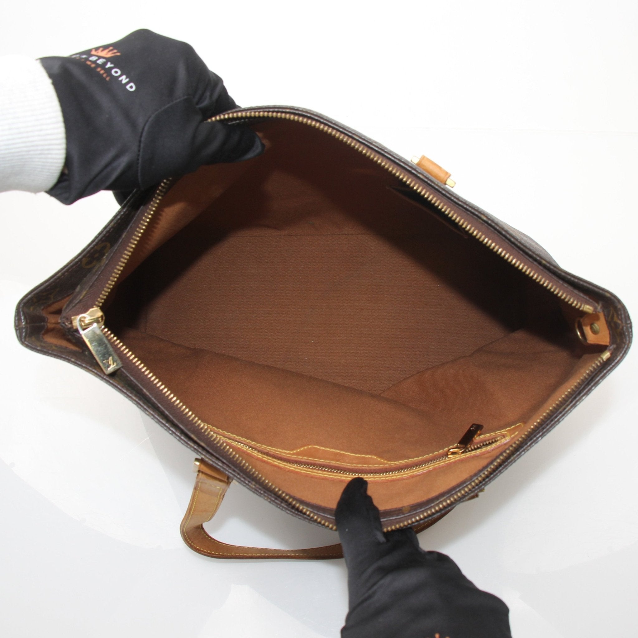 Louis Vuitton Monogram Cabas Piano shoulder tote bag with leather handles and spacious interior, designed for stylish everyday use.