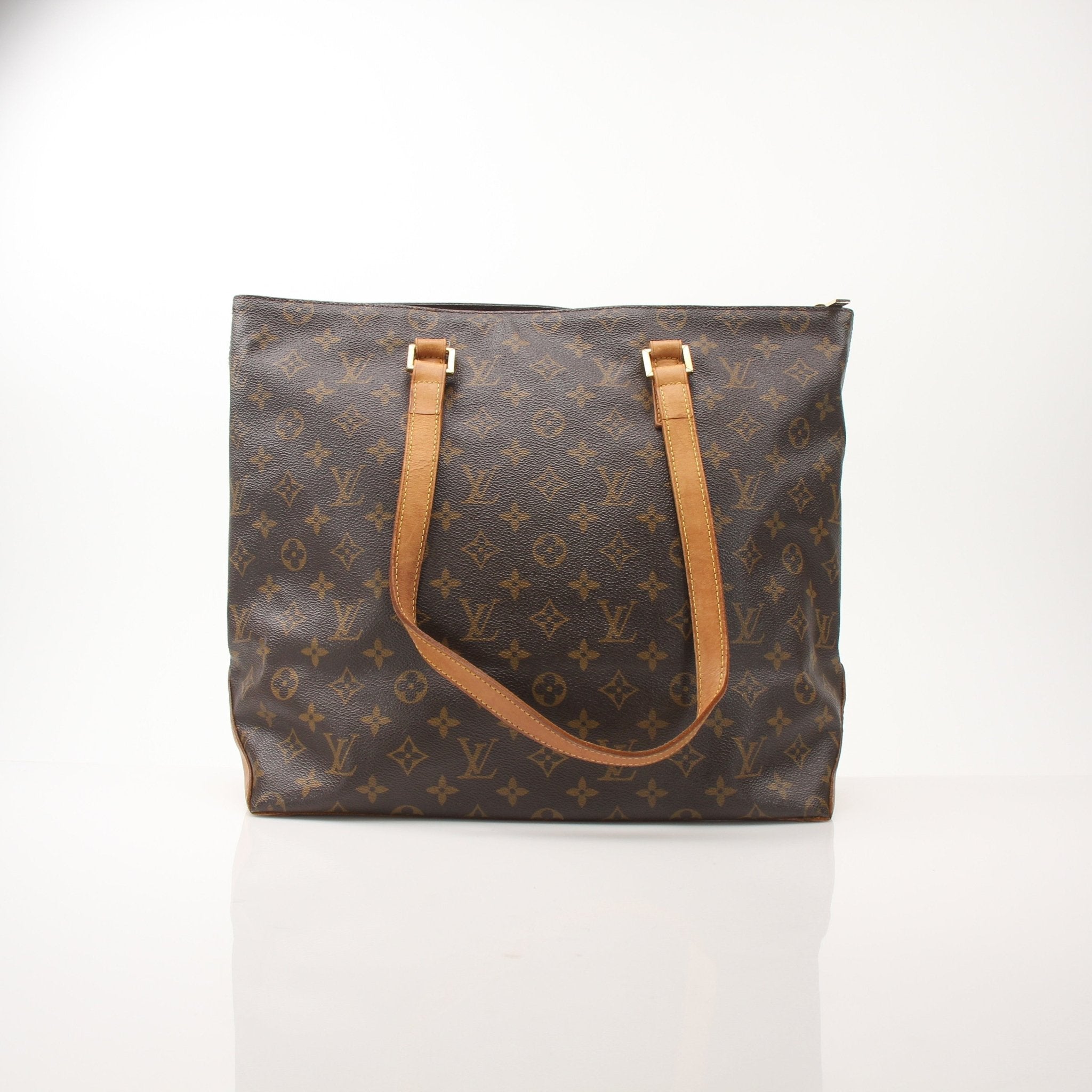 Louis Vuitton Monogram Cabas Piano shoulder tote bag with leather handles and spacious interior, displayed on a neutral background.