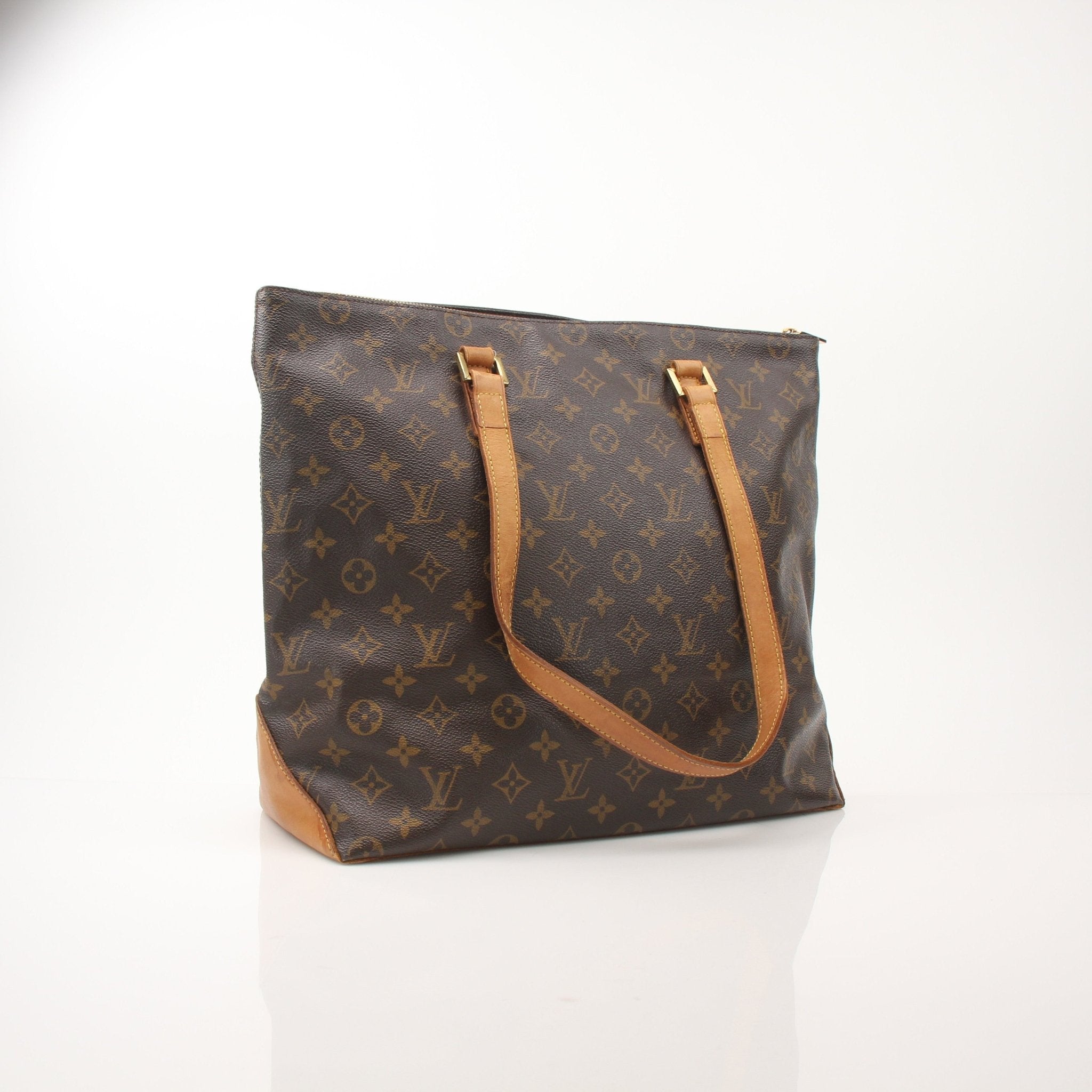 Louis Vuitton Monogram Cabas Piano shoulder tote bag with leather handles and gold-tone hardware, stylish and spacious handbag.