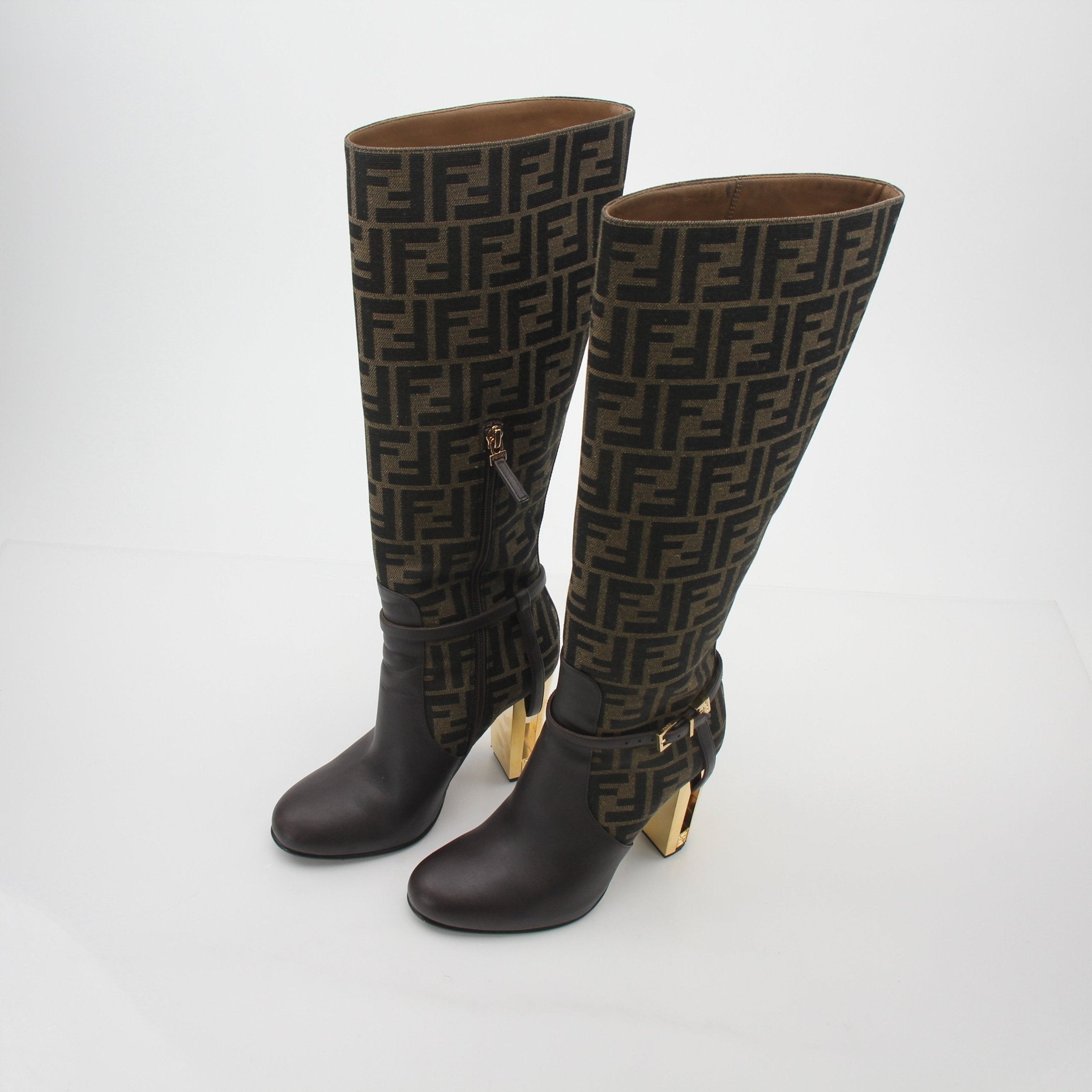 Fendi brown FF Jacquard Delfina knee-high boots with block heels and pointed toes, featuring a stylish jacquard pattern.
