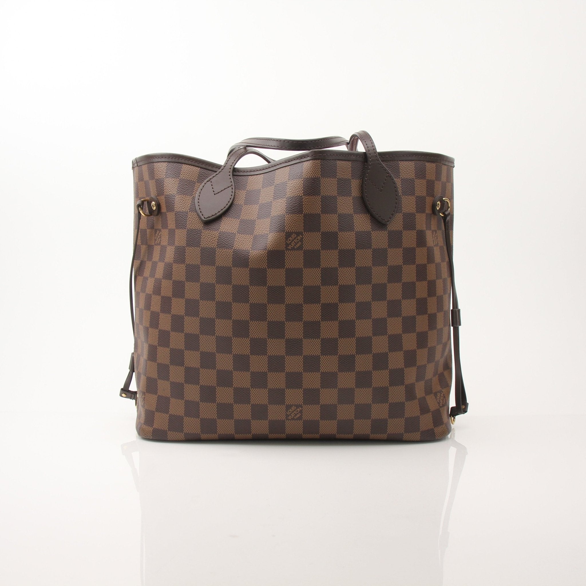 Louis Vuitton Neverfull MM tote bag, elegant handbag with monogram canvas and leather trim, displayed on a neutral background.