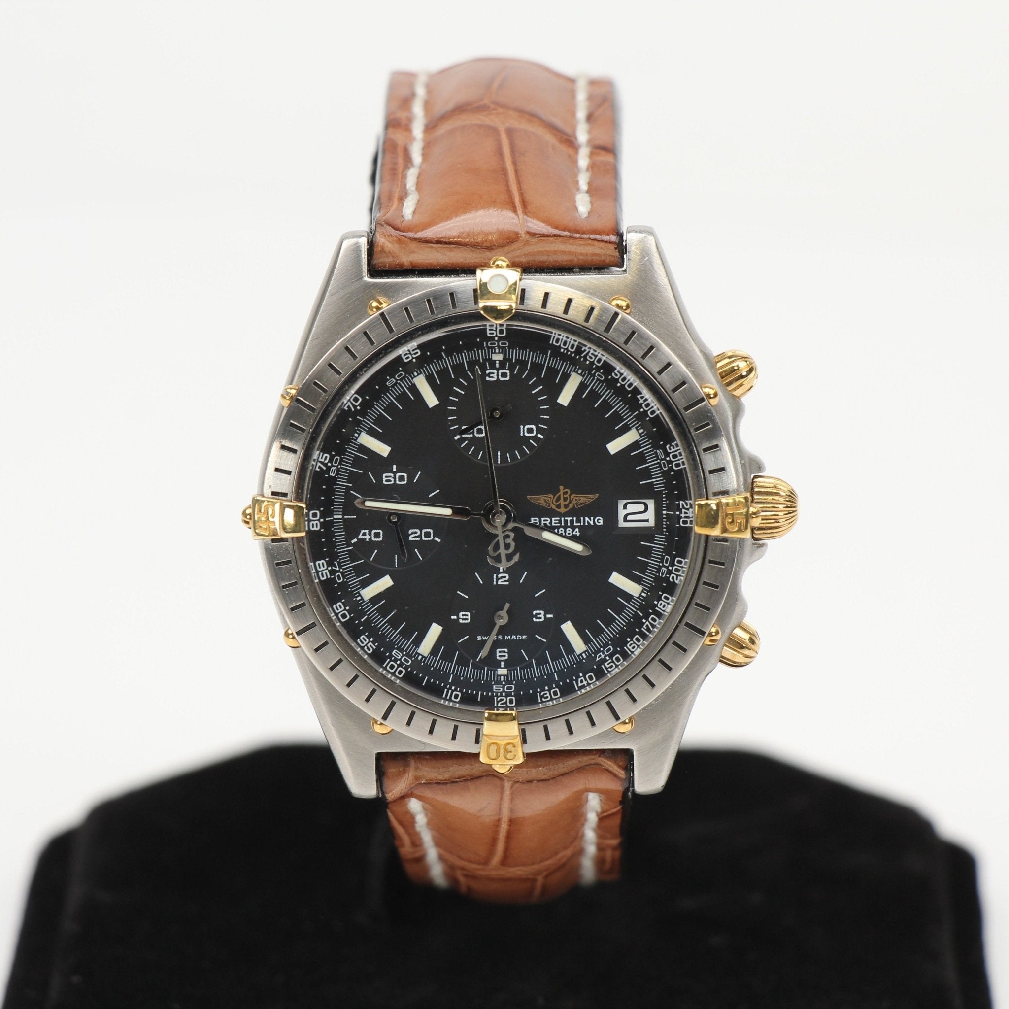 Gold & Beyond Breitling Chronomat 81 watch with stainless steel case, black dial, and chronograph features.