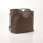 Louis Vuitton Neverfull MM tote handbag with monogram canvas and leather trim, displayed on a neutral background.