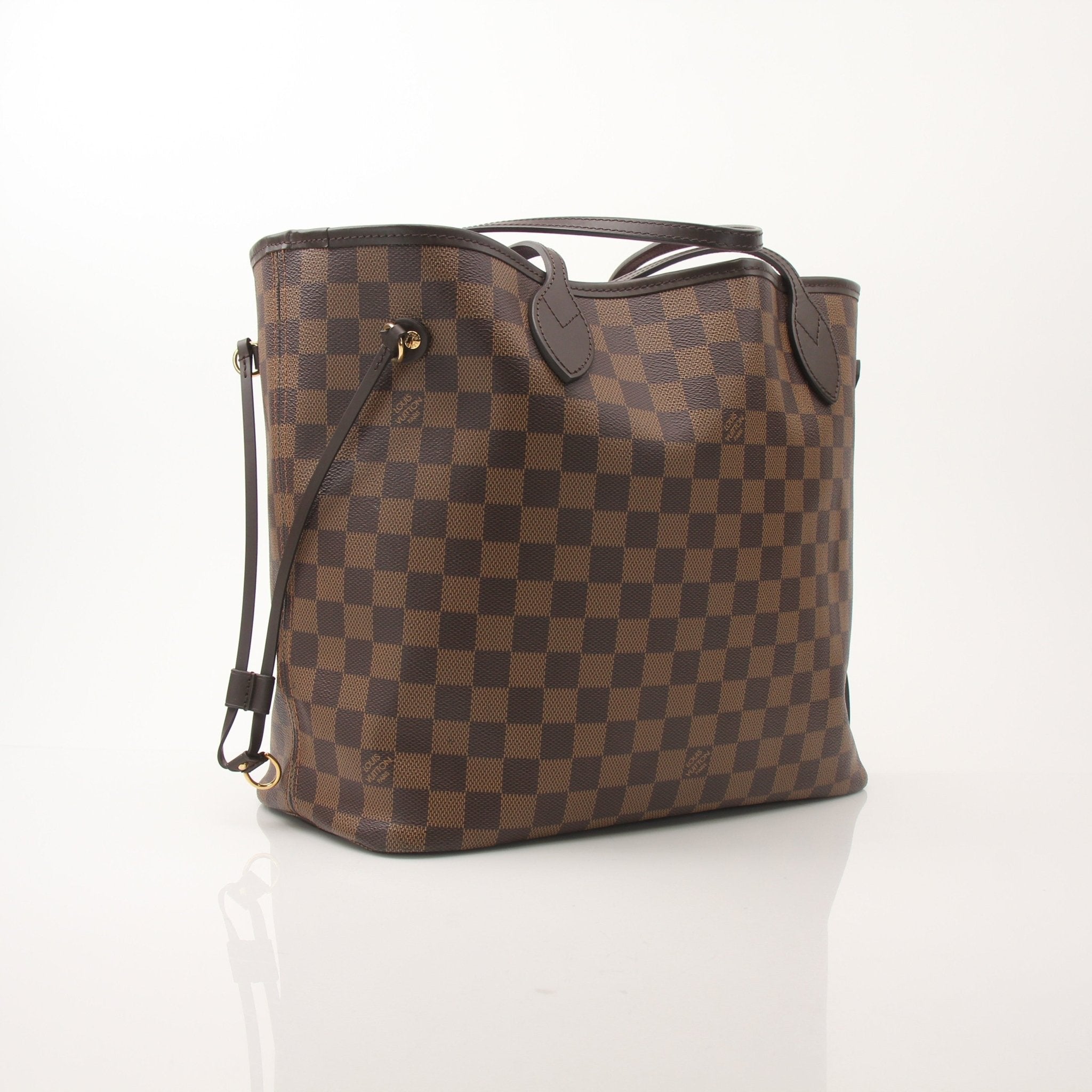 Louis Vuitton Neverfull MM tote handbag with monogram canvas and leather trim, displayed on a neutral background.