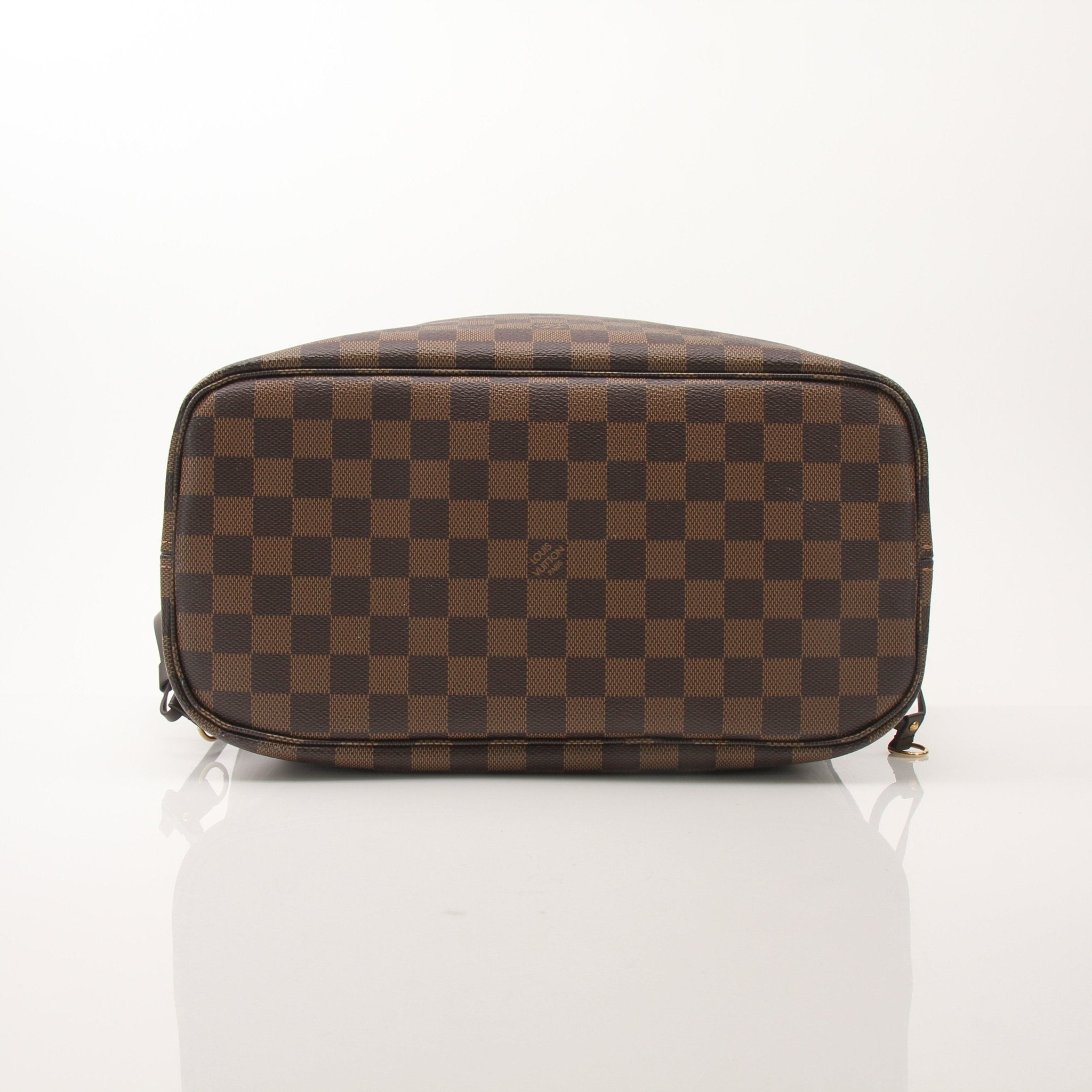 Louis Vuitton Neverfull MM tote bag by Gold & Beyond, showcasing the beige monogram canvas and leather trim with handles.